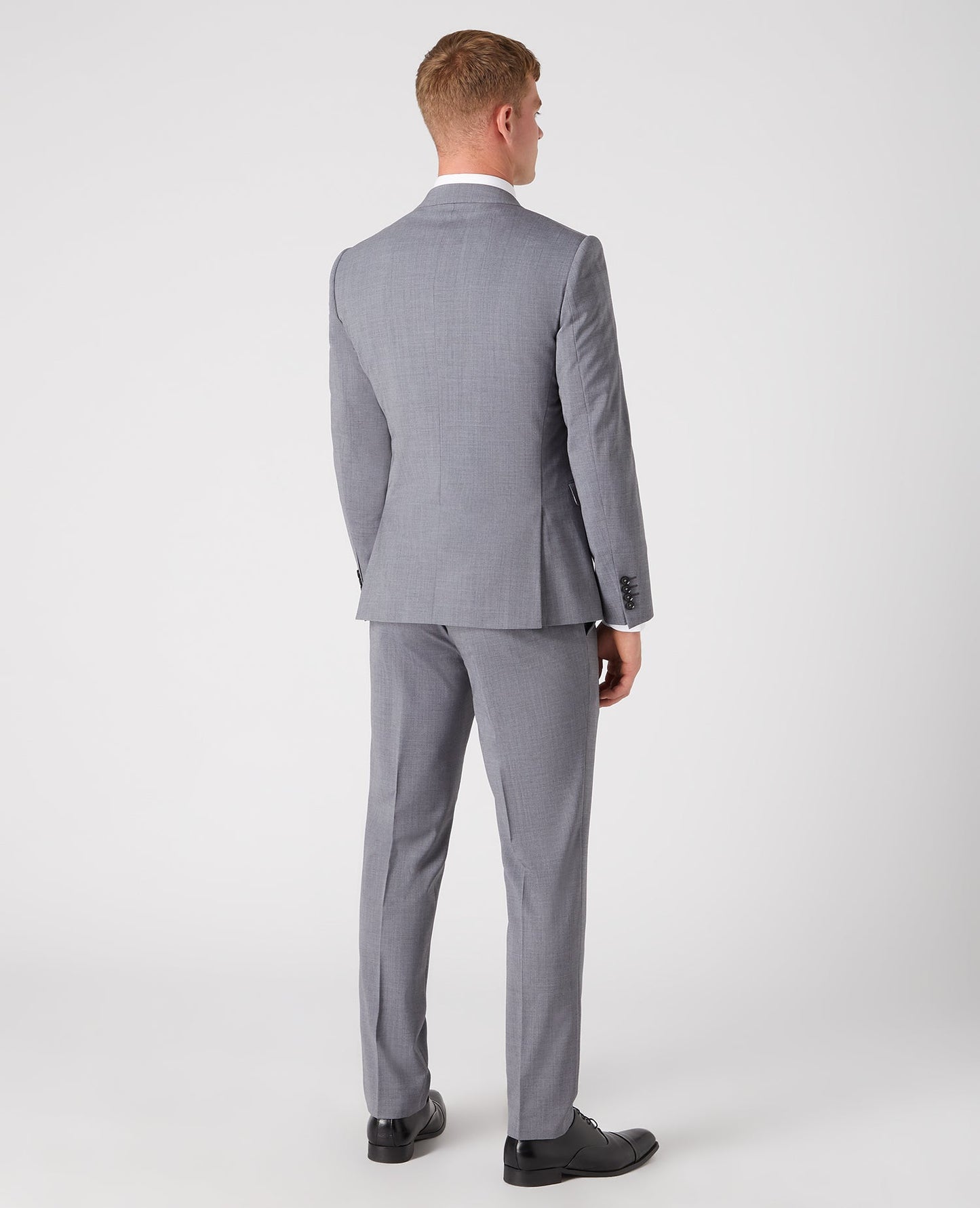 Man wearing a grey Slim Fit Wool-Rich Stretch Mix and Match Suit