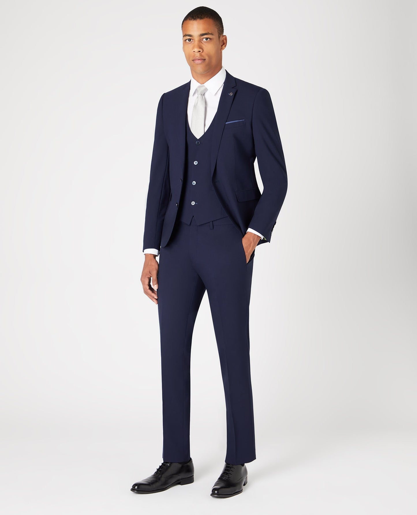 Man wearing a navy Slim Fit Wool-Rich Stretch Mix and Match Suit