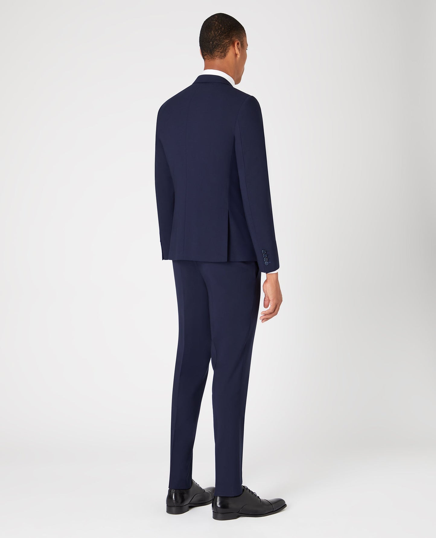 Man wearing a navy Slim Fit Wool-Rich Stretch Mix and Match Suit