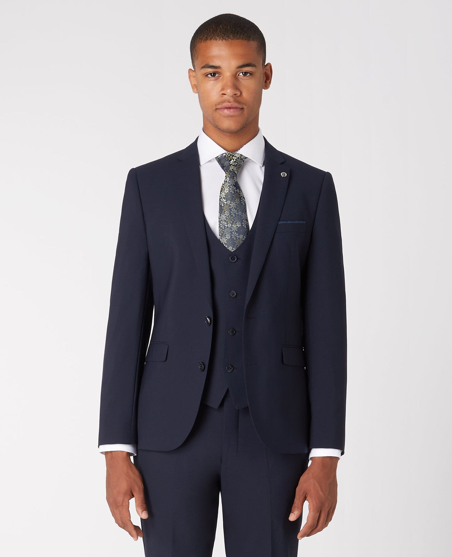 Man wearing a navy Slim Fit Wool-Rich Stretch Mix and Match Suit Jacket
