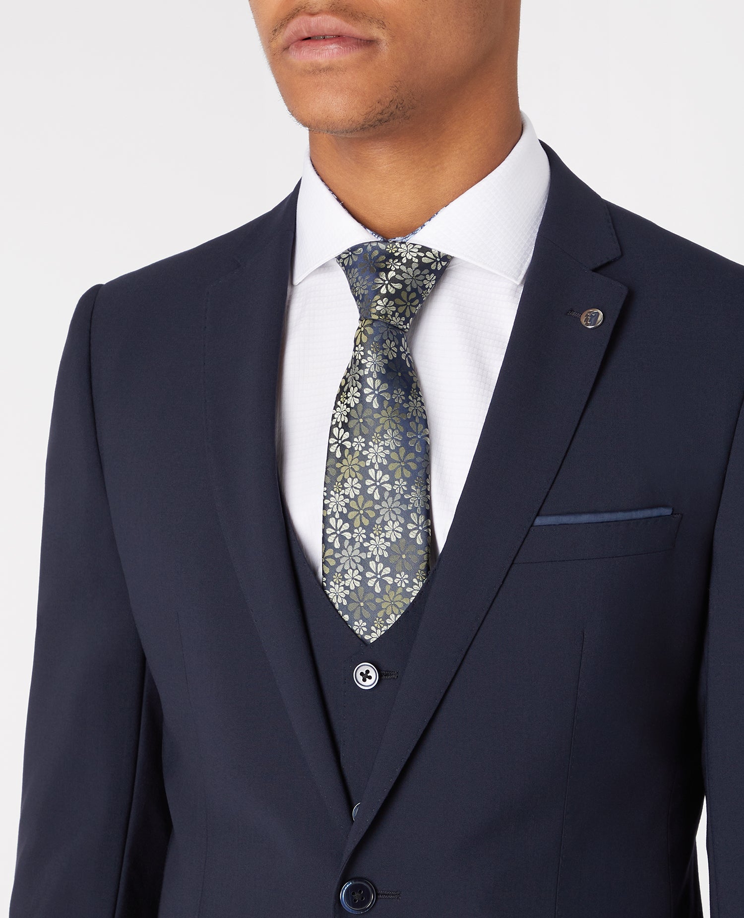 Man wearing a navy Slim Fit Wool-Rich Stretch Mix and Match Suit Jacket