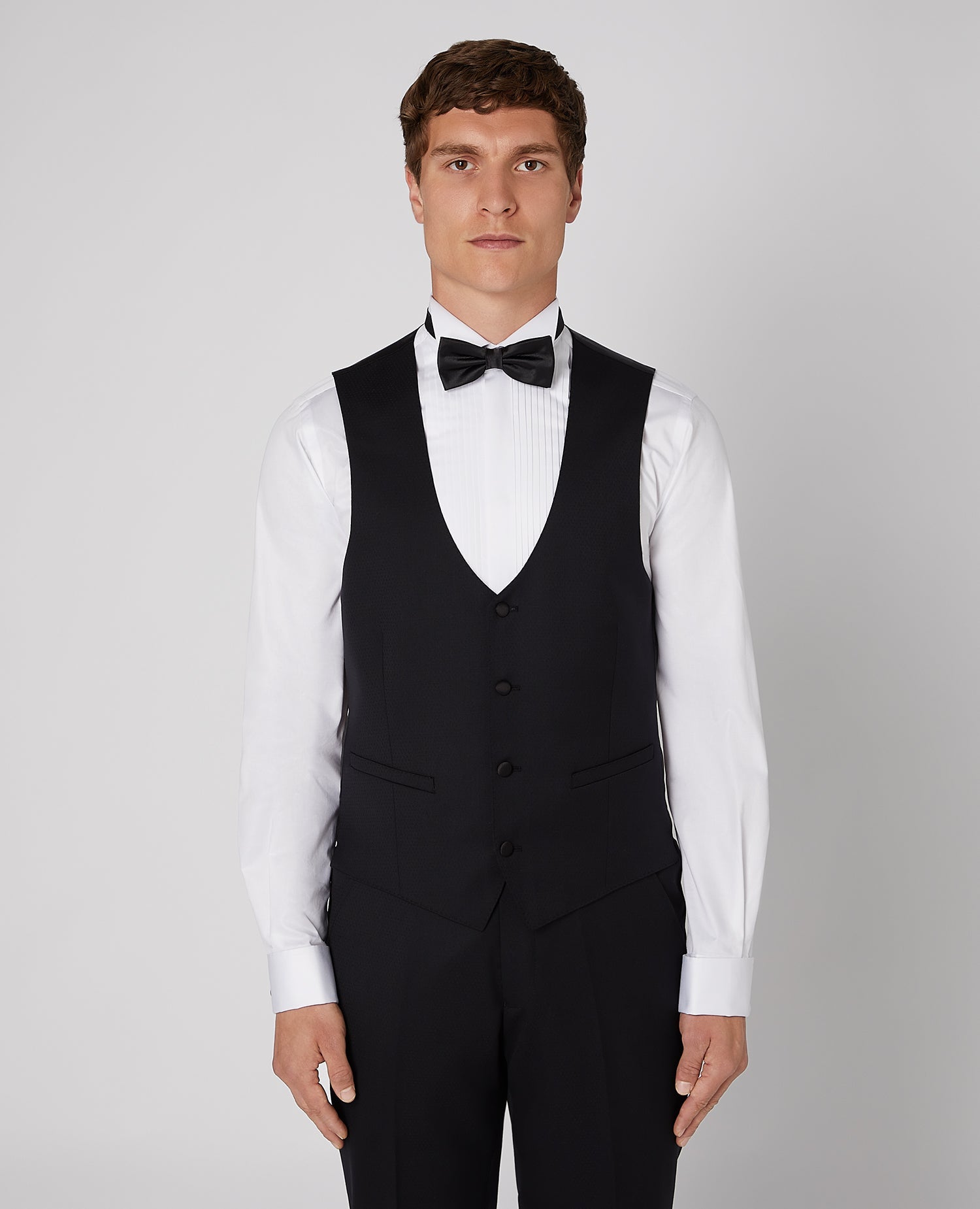 Man wearing a black Slim Fit Wool-Rich Mix and Match Waistcoat