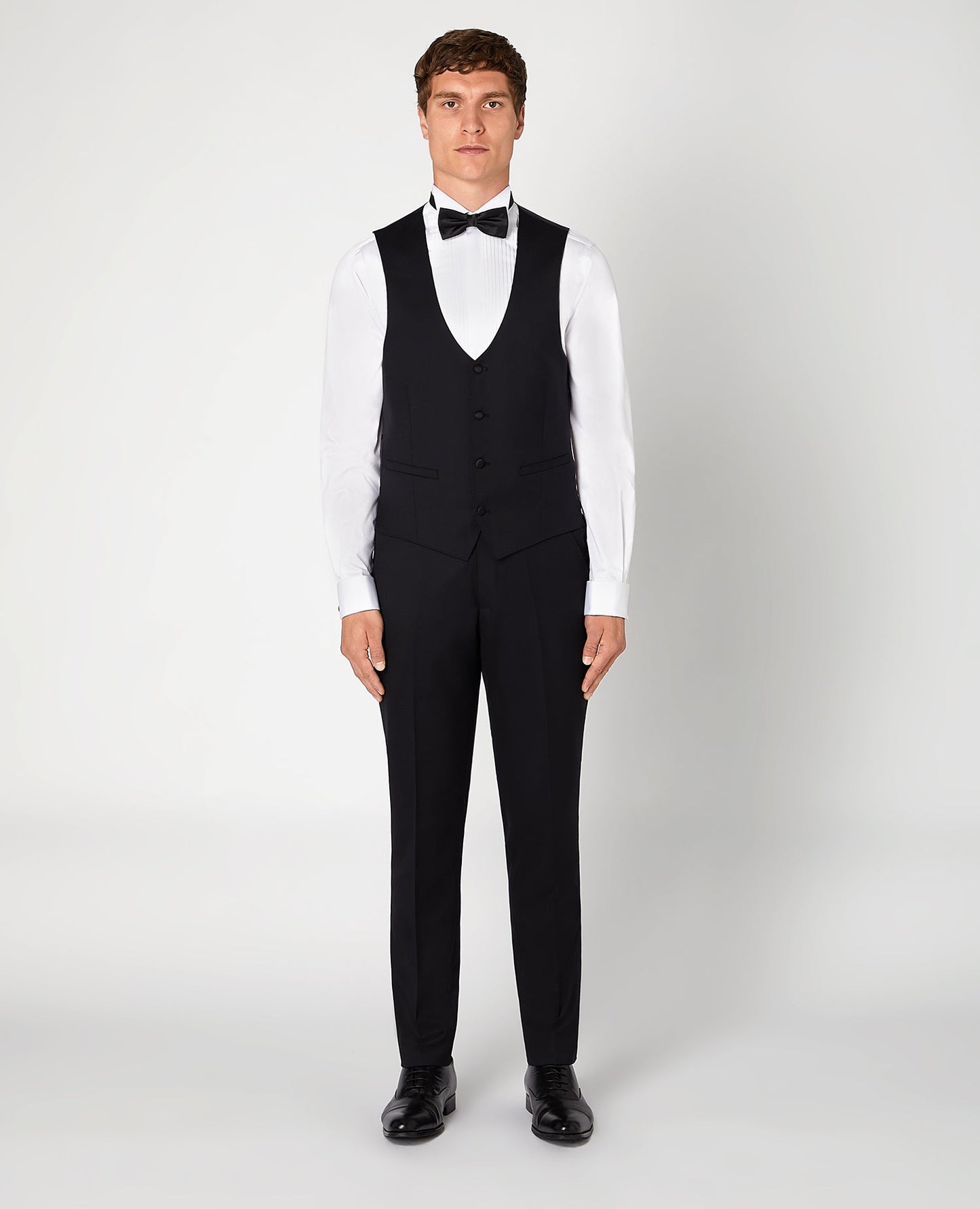 Man wearing a black Slim Fit Wool-Rich Mix and Match Waistcoat