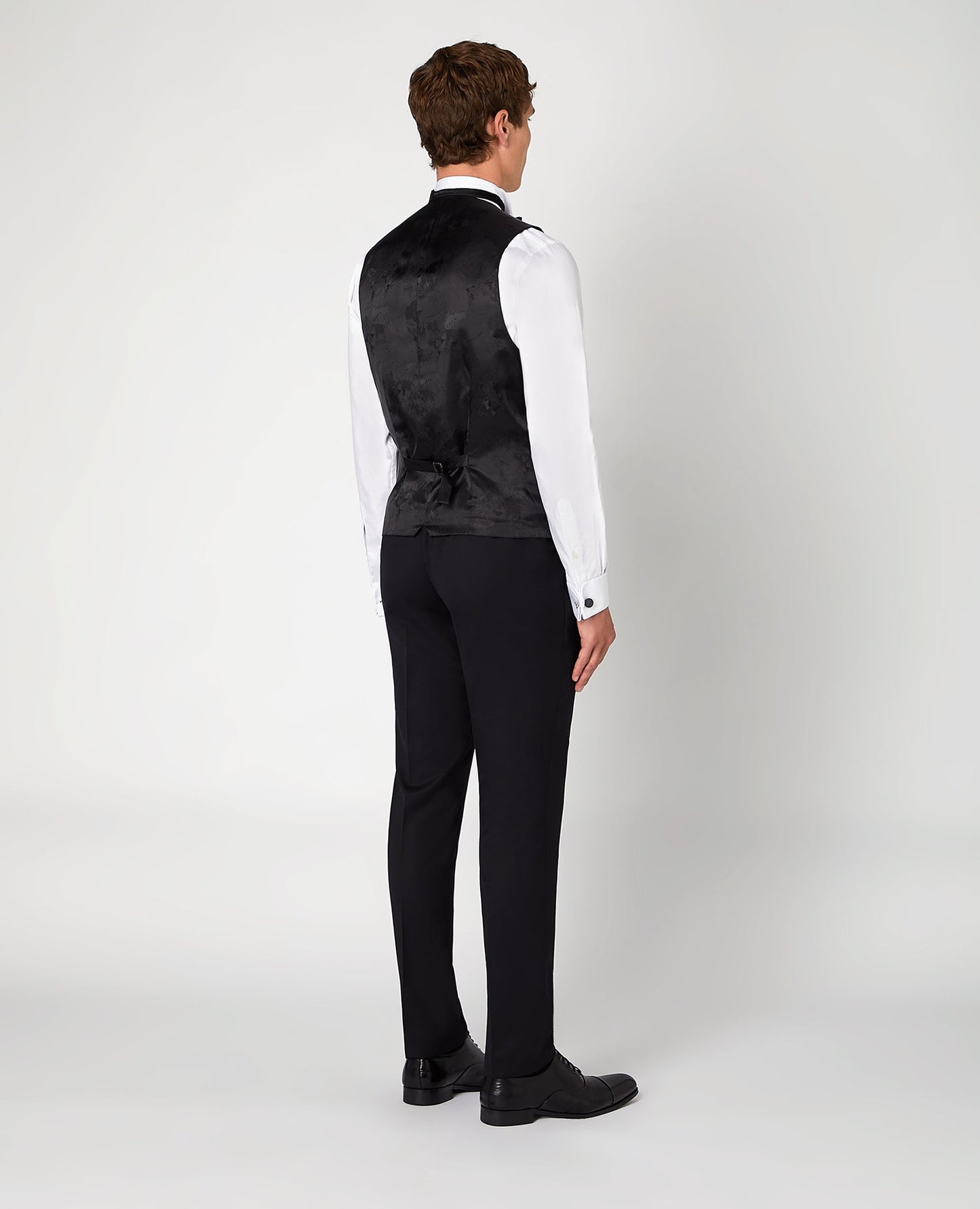 Man wearing a black Slim Fit Wool-Rich Mix and Match Waistcoat