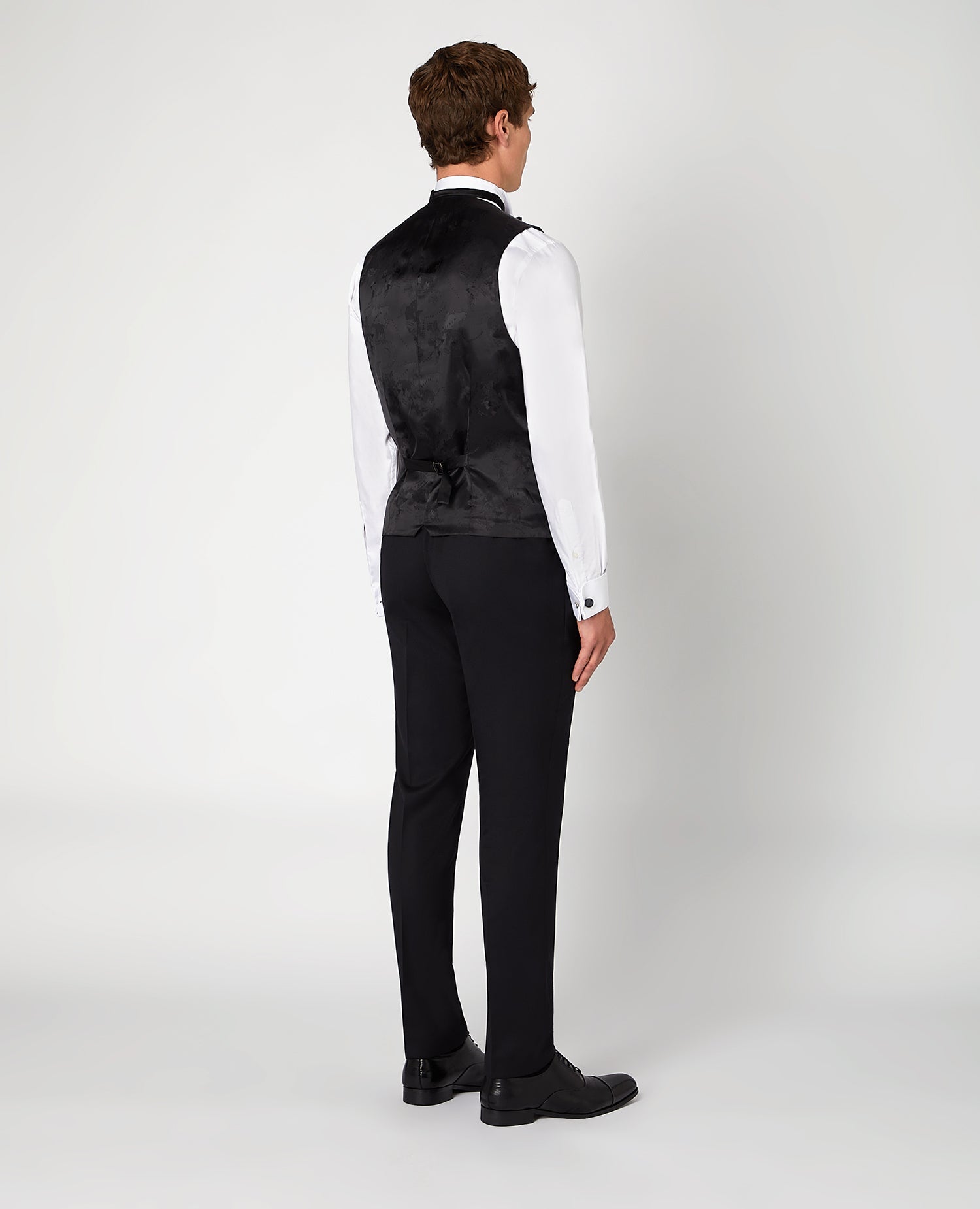 Man wearing a black Slim Fit Wool-Rich Mix and Match Waistcoat