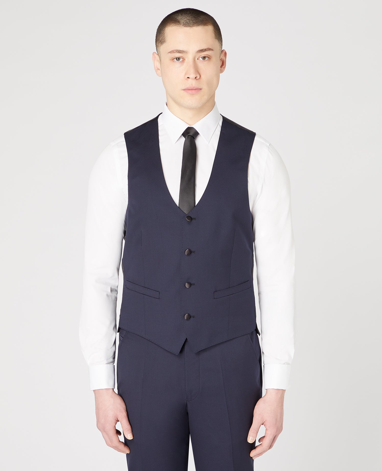 Man wearing a navy Slim Fit Wool-Rich Mix and Match Waistcoat