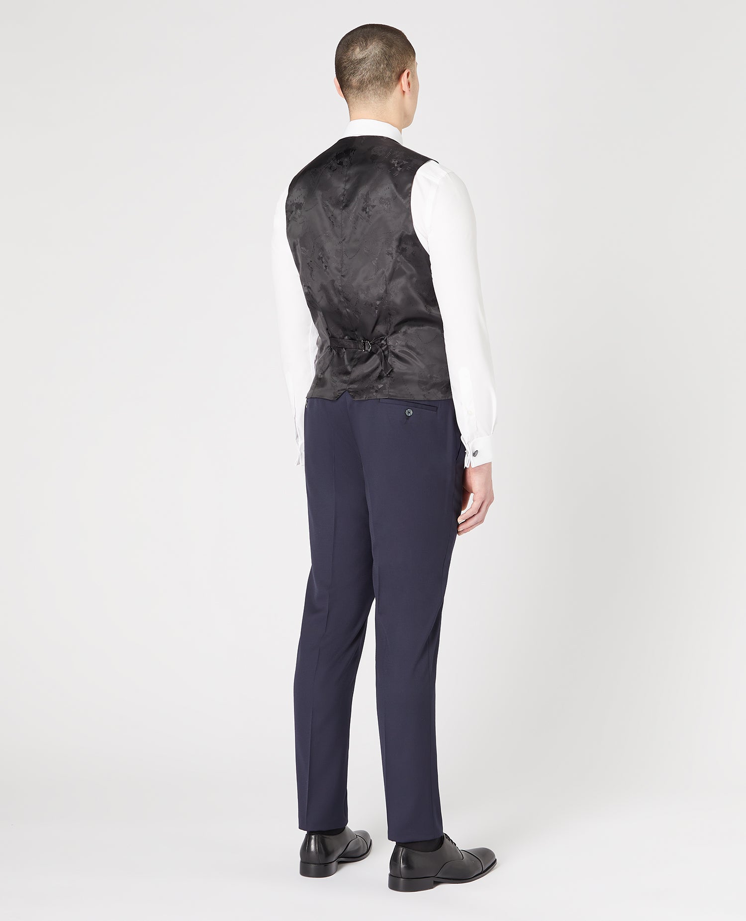 Man wearing a navy Slim Fit Wool-Rich Mix and Match Waistcoat