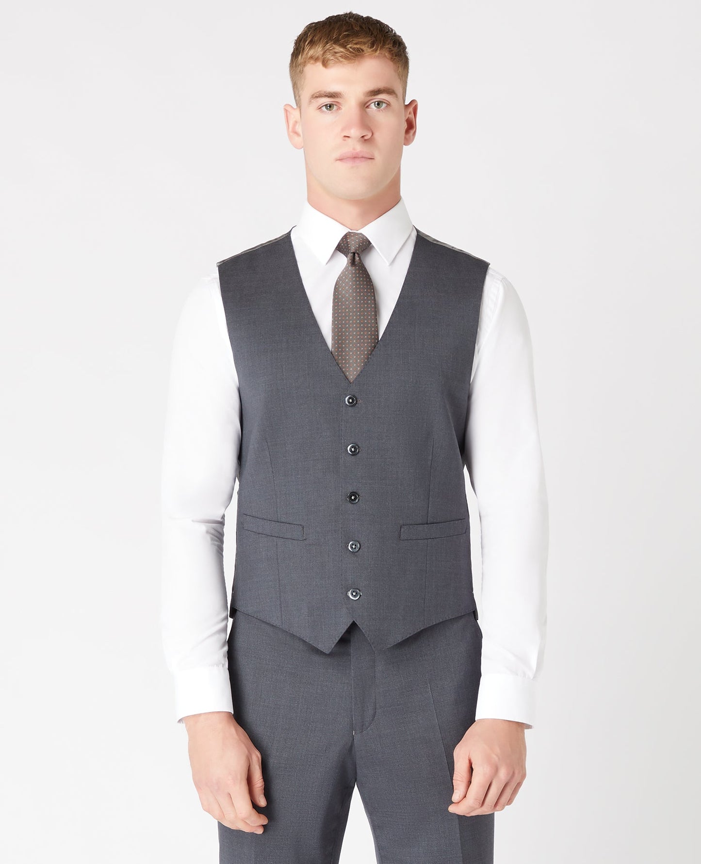 Man wearing a grey Tapered Fit Wool-Blend Stretch Mix and Match Waistcoat