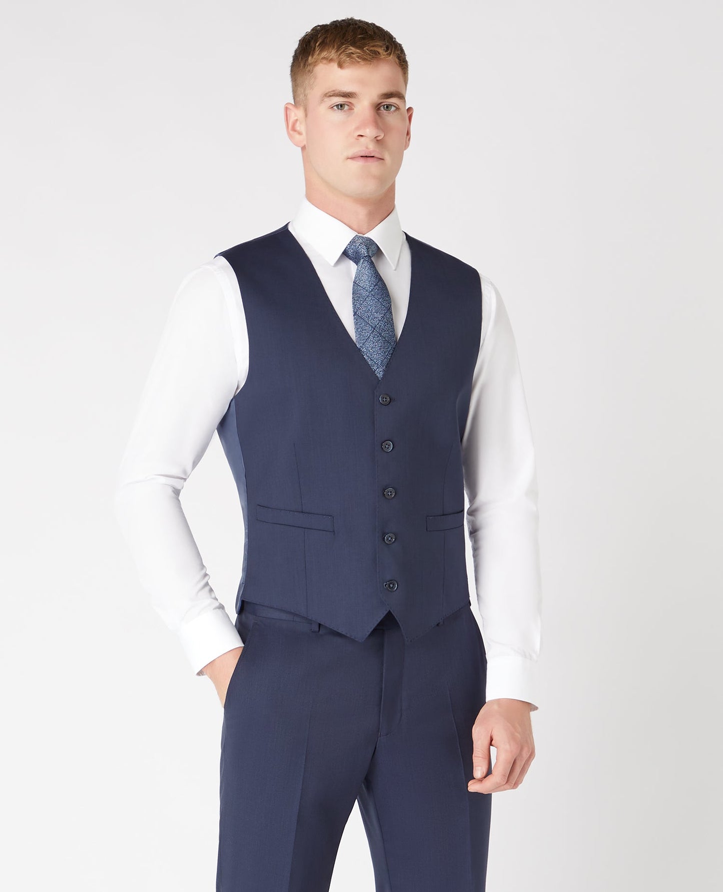 Man wearing a navy Tapered Fit Wool-Blend Stretch Mix and Match Waistcoat