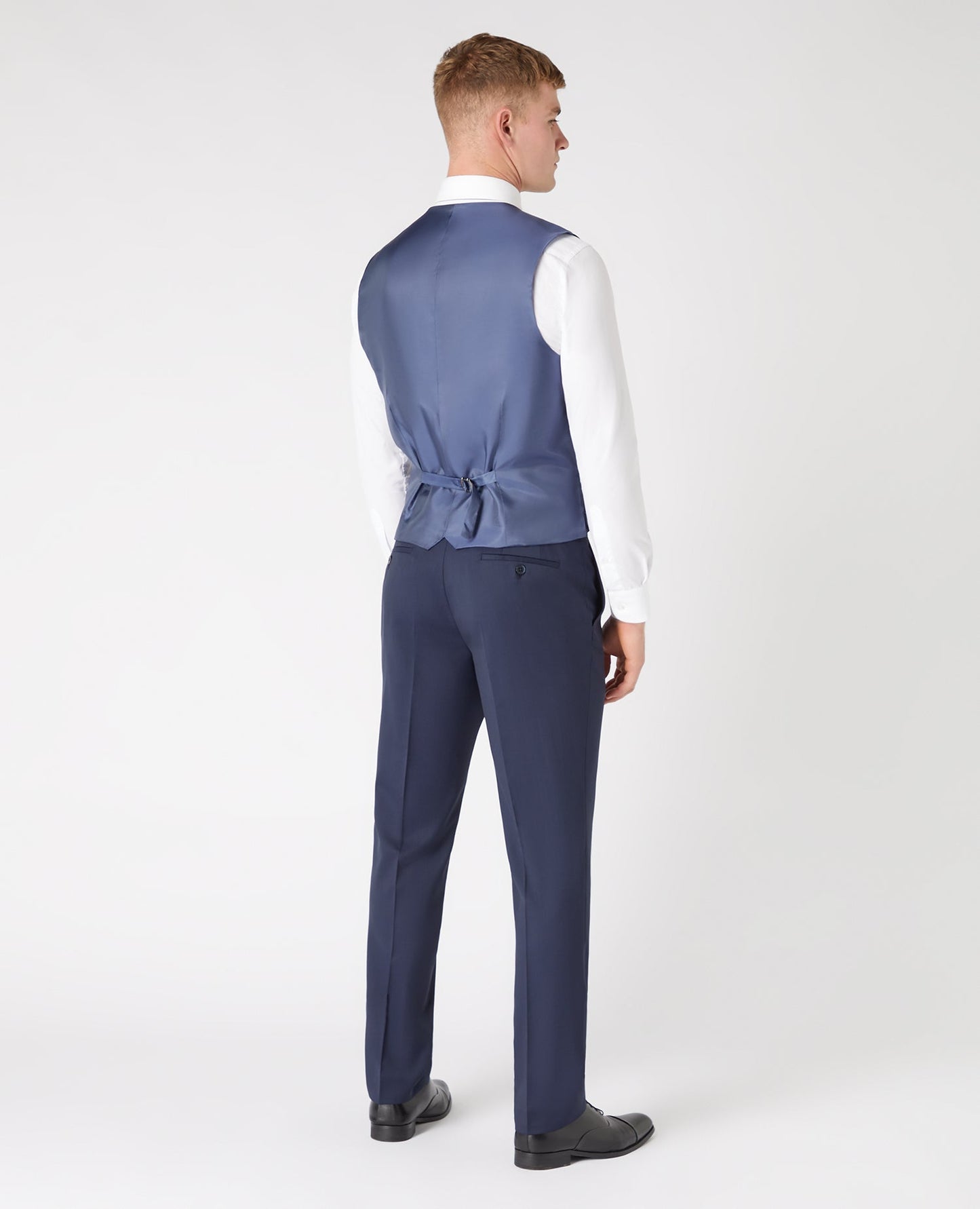 Man wearing a navy Tapered Fit Wool-Blend Stretch Mix and Match Waistcoat