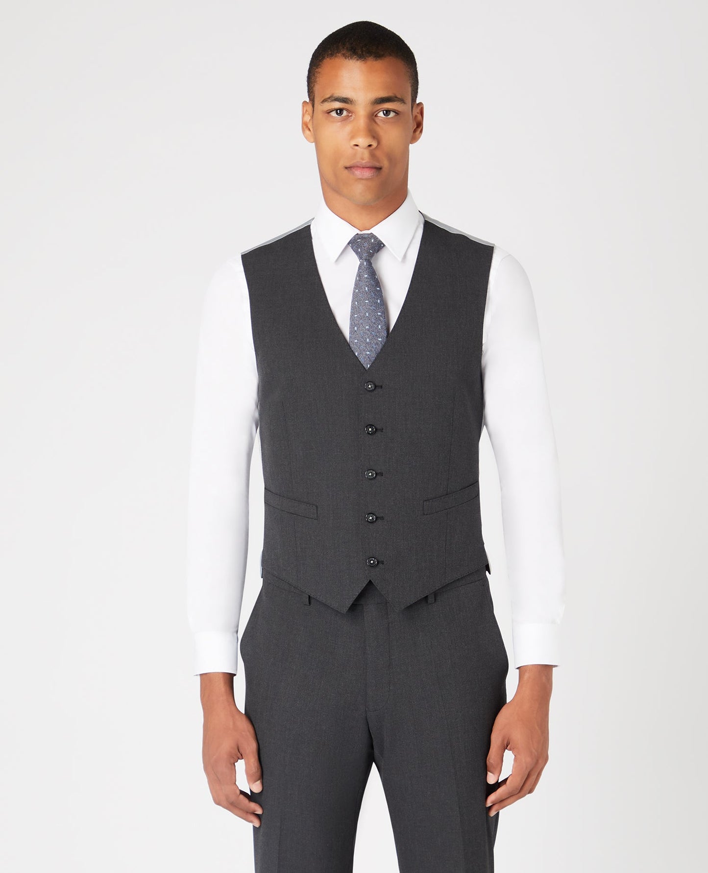 Man wearing a grey Tapered Fit Polyviscose Stretch Waistcoat
