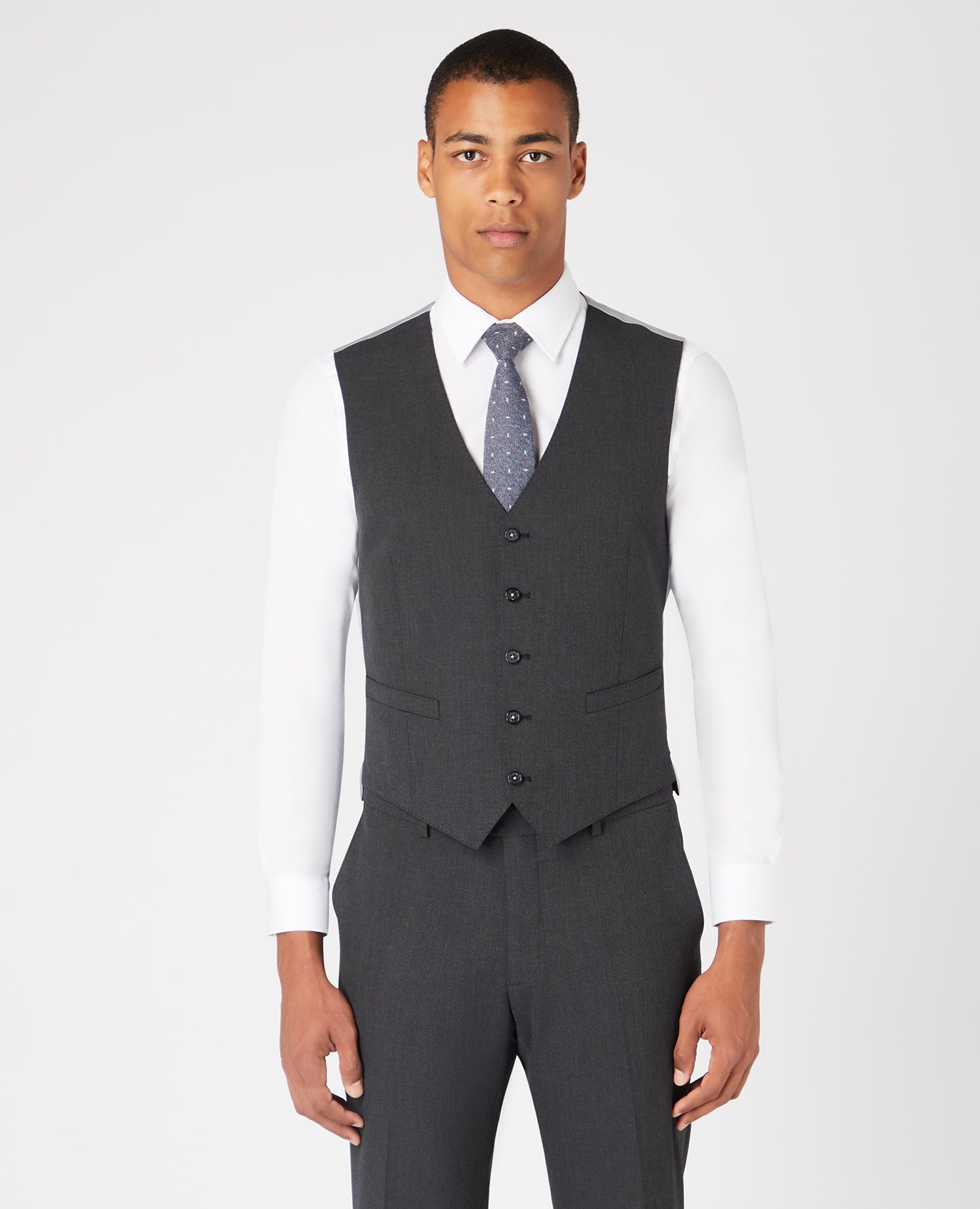Man wearing a grey Tapered Fit Polyviscose Stretch Waistcoat