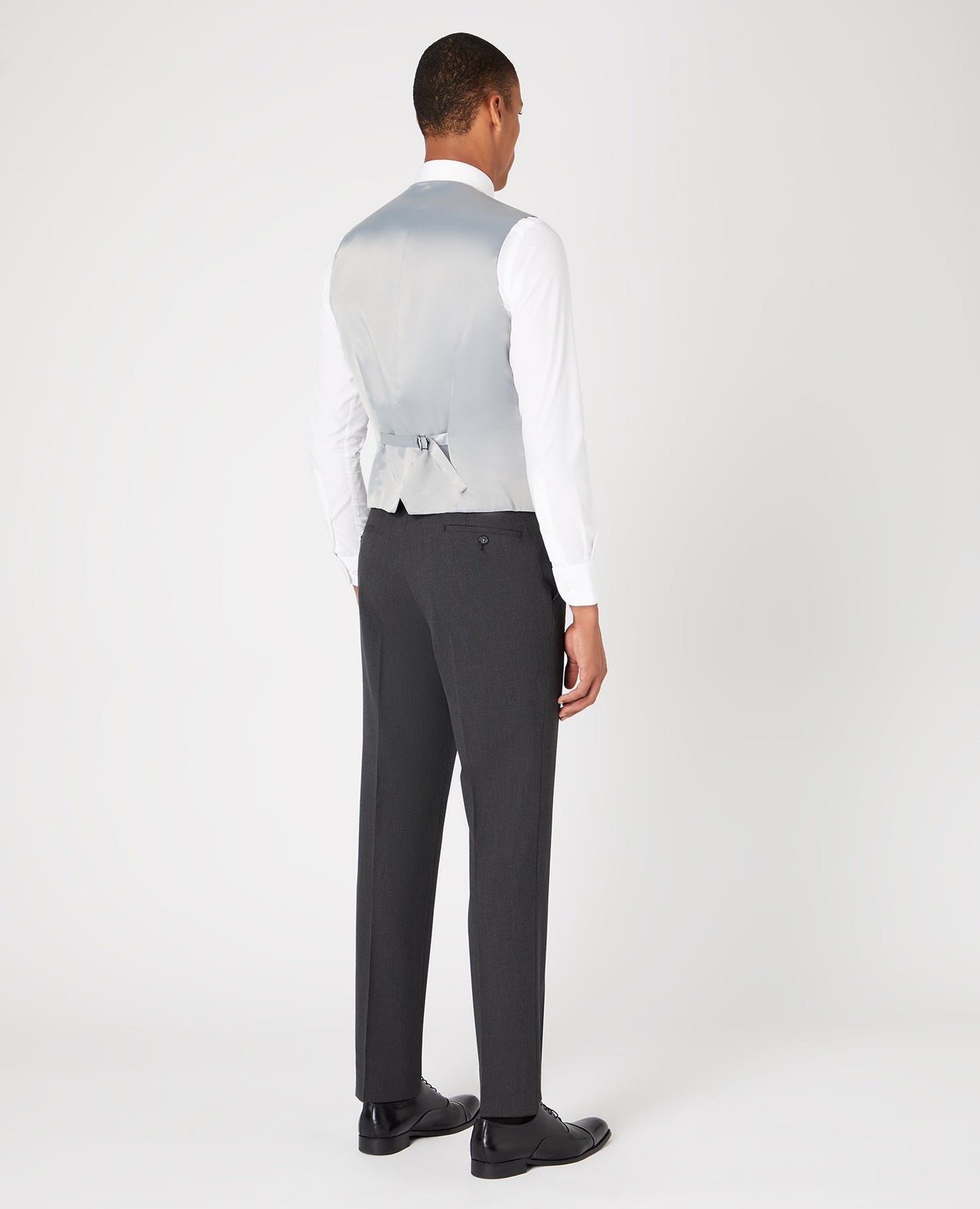 Man wearing a grey Tapered Fit Polyviscose Stretch Waistcoat