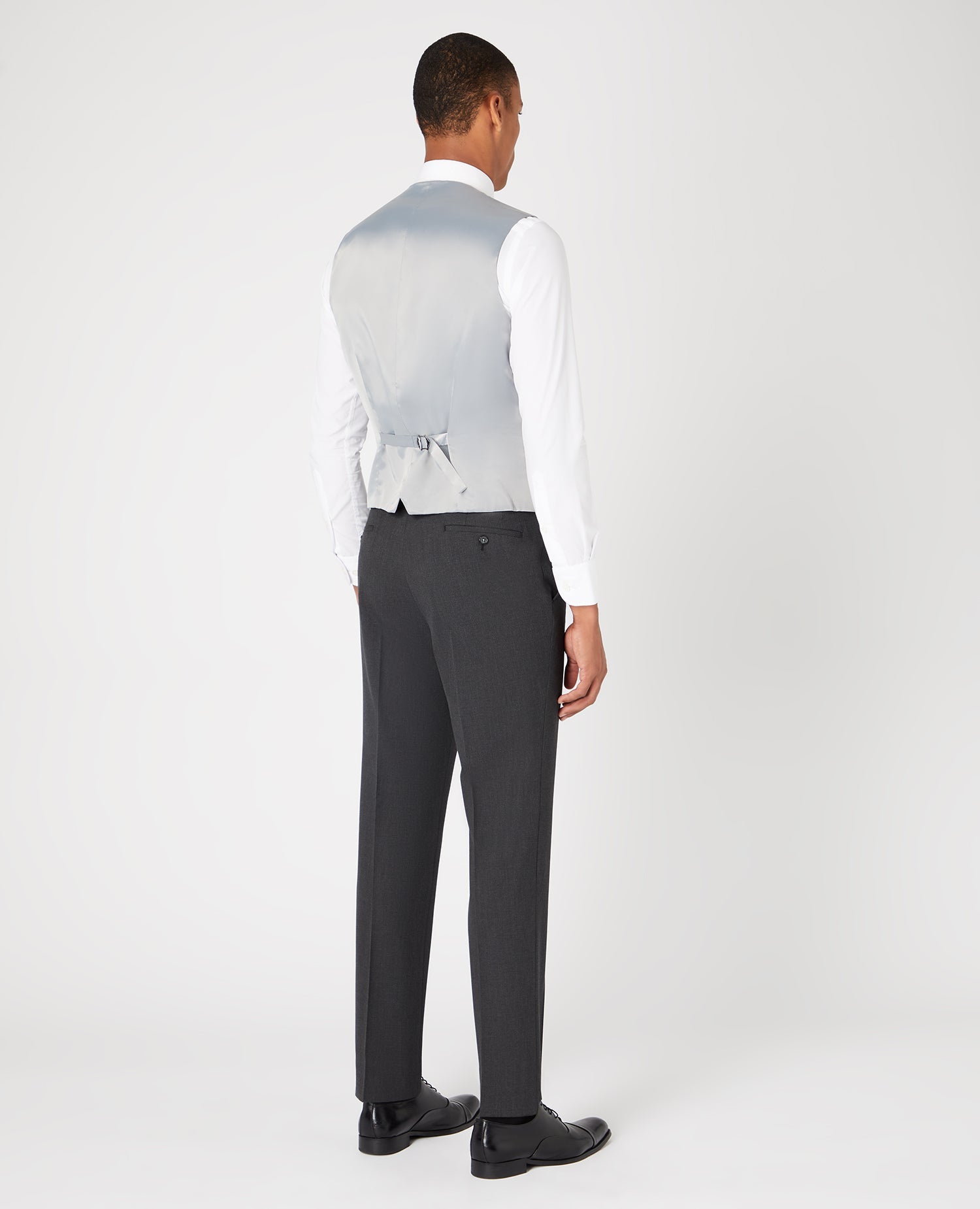 Man wearing a grey Tapered Fit Polyviscose Stretch Waistcoat