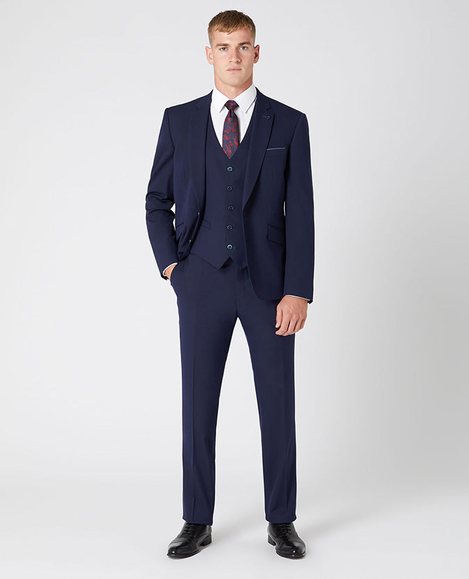 Man wearing a navy Tapered Fit Stretch Waistcoat