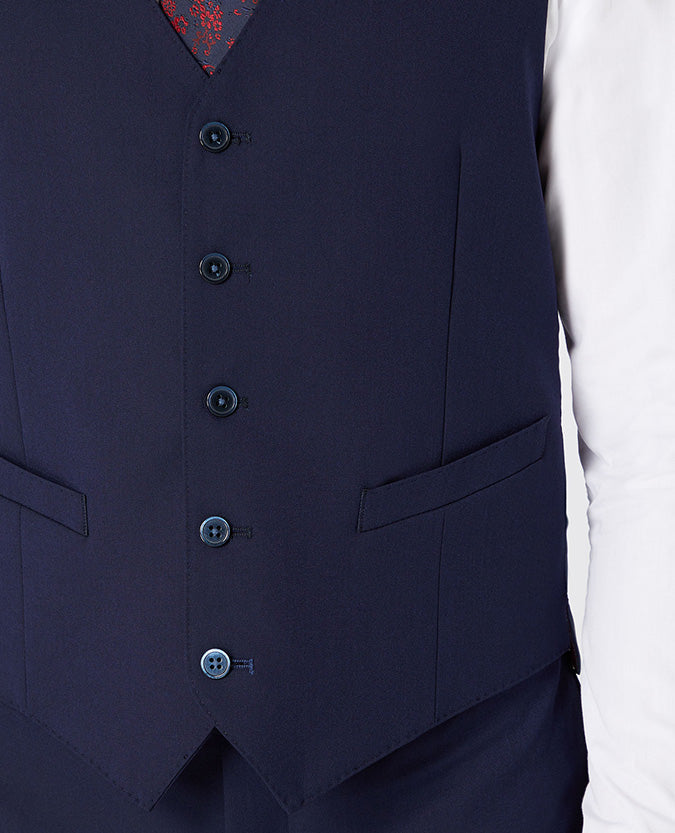 Man wearing a navy Tapered Fit Stretch Waistcoat