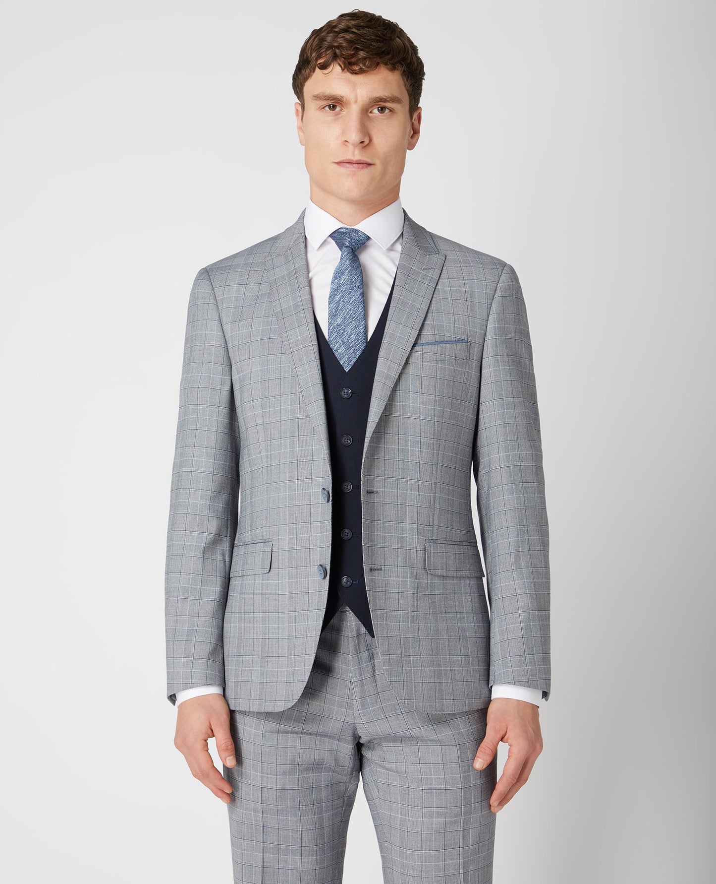 Man wearing a navy Tapered Fit Stretch Waistcoat