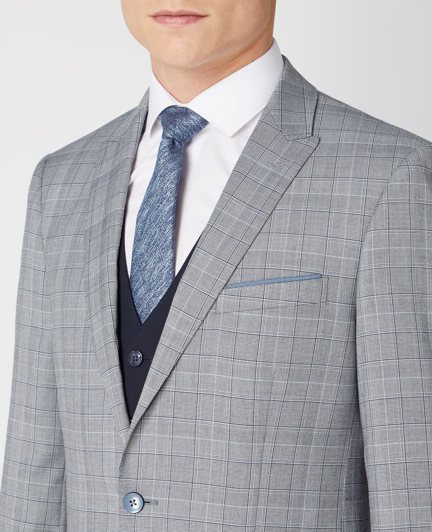 Man wearing a navy Tapered Fit Stretch Waistcoat