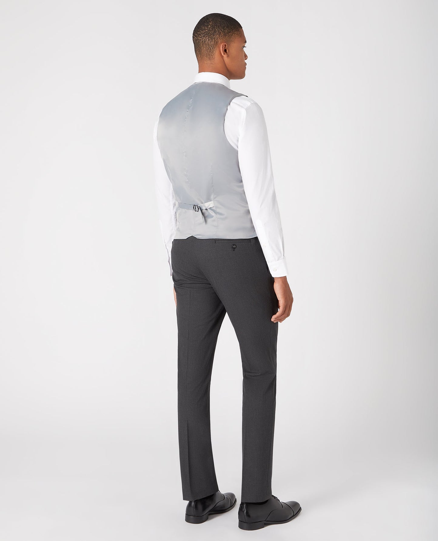 Man wearing a grey Slim fit polyviscose stretch waistcoat