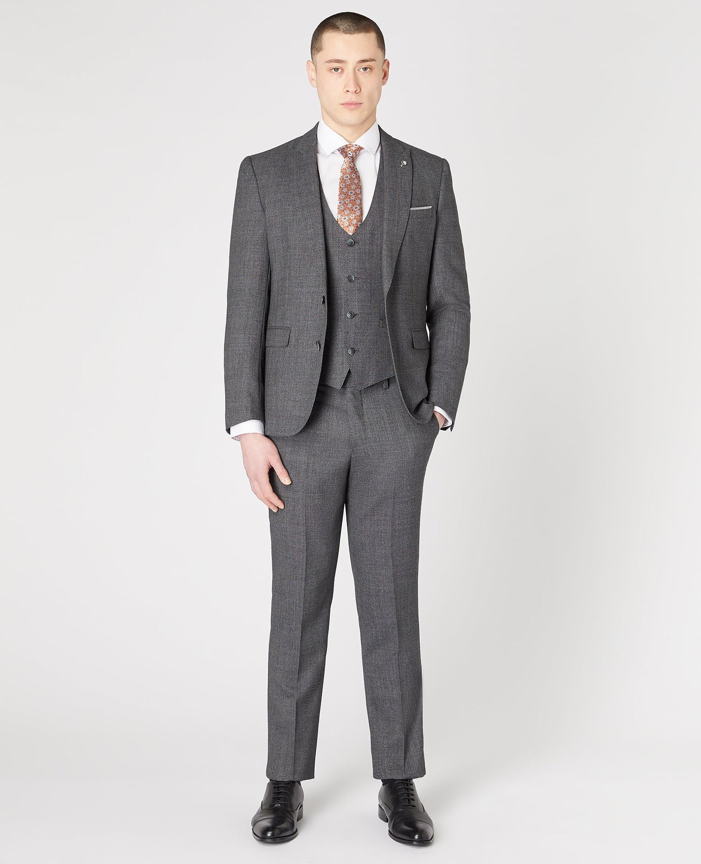 Man wearing a grey Slim Fit Wool-Rich Mix and Match Suit Waistcoat