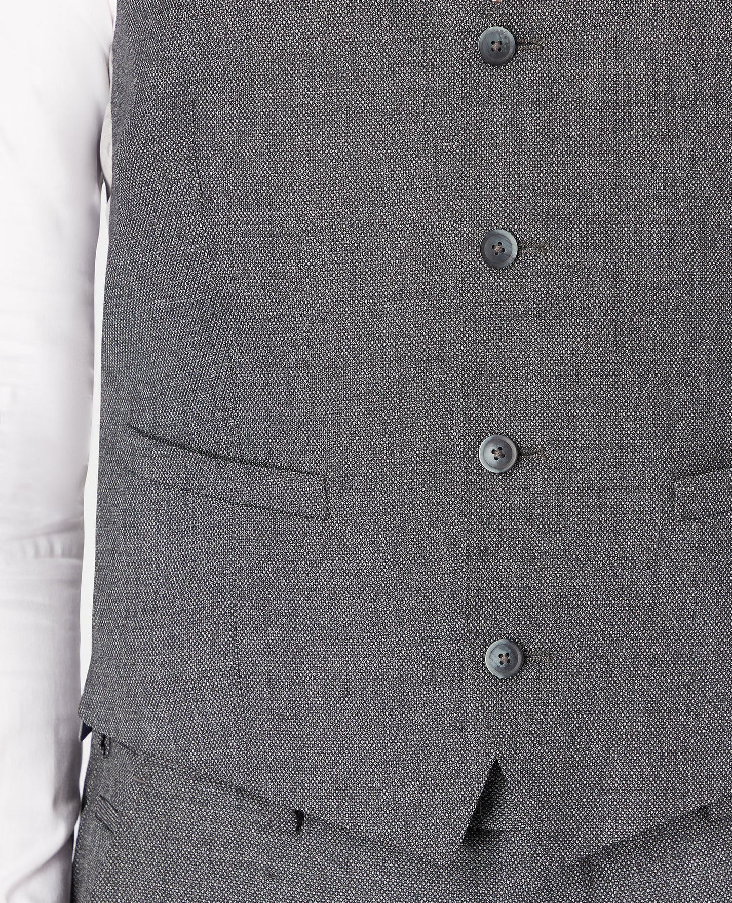 Man wearing a grey Slim Fit Wool-Rich Mix and Match Suit Waistcoat