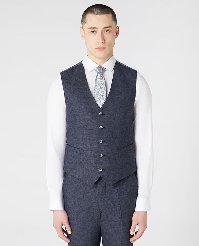 Man wearing a blue Tapered Fit Wool-Rich Mix and Match Suit Waistcoat