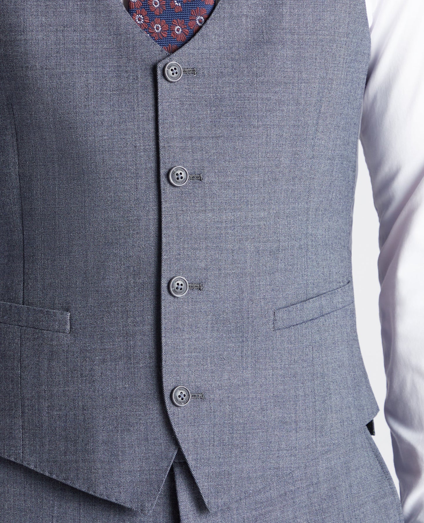 Man wearing a blue X-Slim Fit Wool Blend Mix And Match Suit Waistcoat