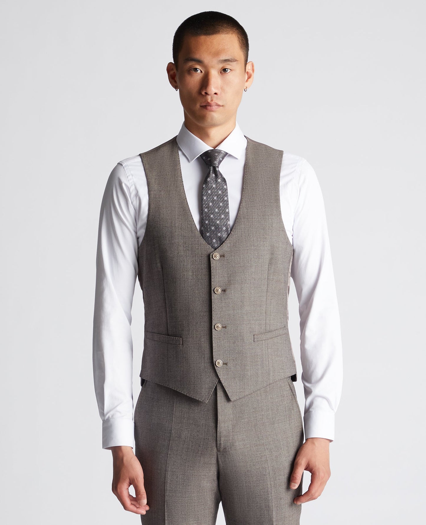 Man wearing a brown X-Slim Fit Wool Blend Mix And Match Suit Waistcoat