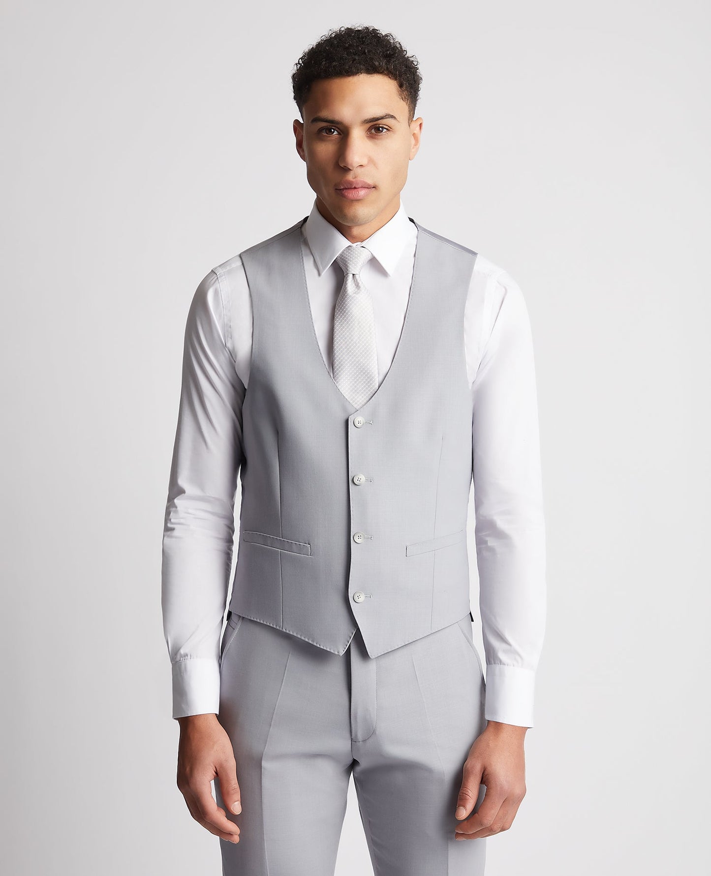 Man wearing a blue Slim Fit Wool Rich Mix and Match Waistcoat