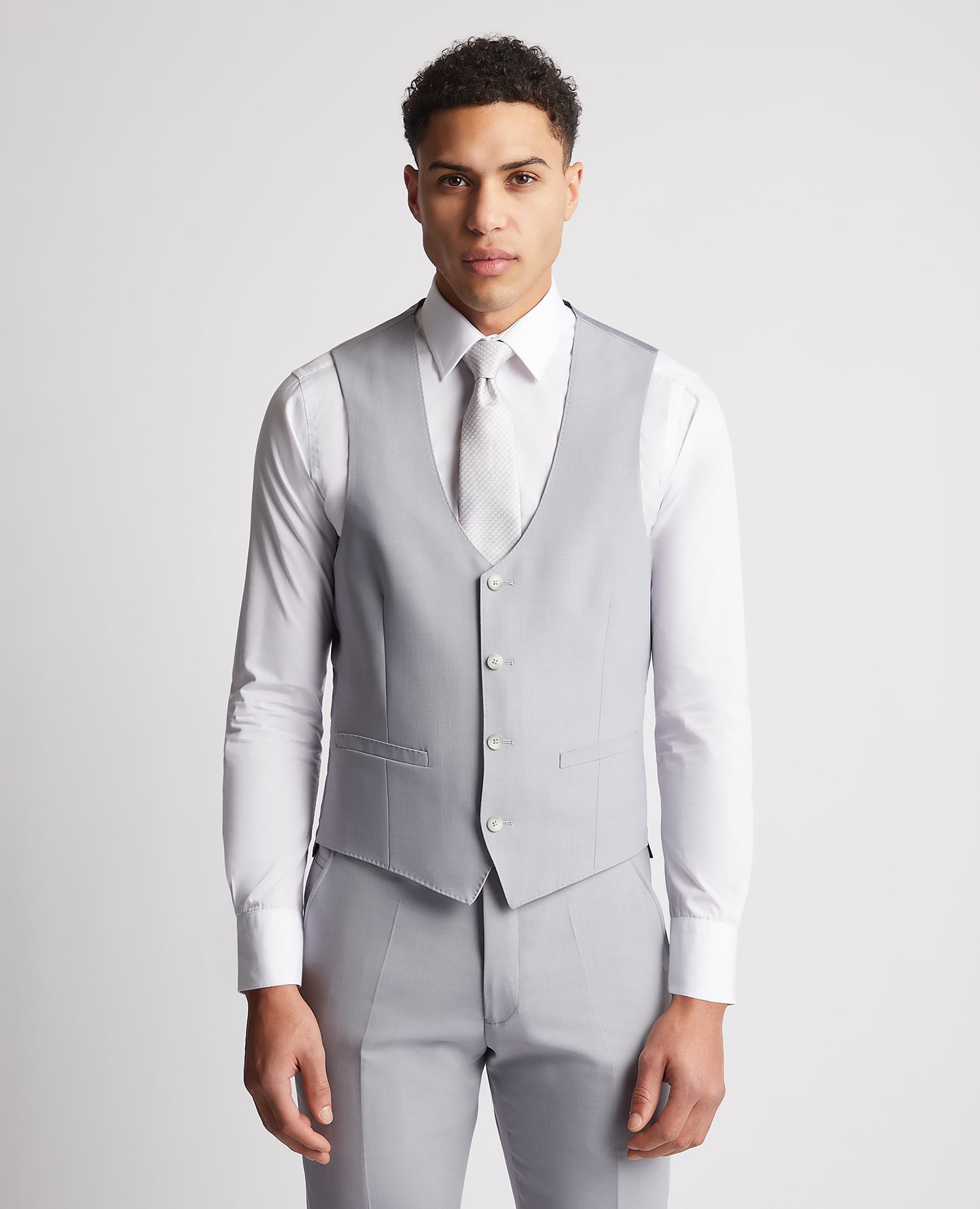 Man wearing a blue Slim Fit Wool Rich Mix and Match Waistcoat