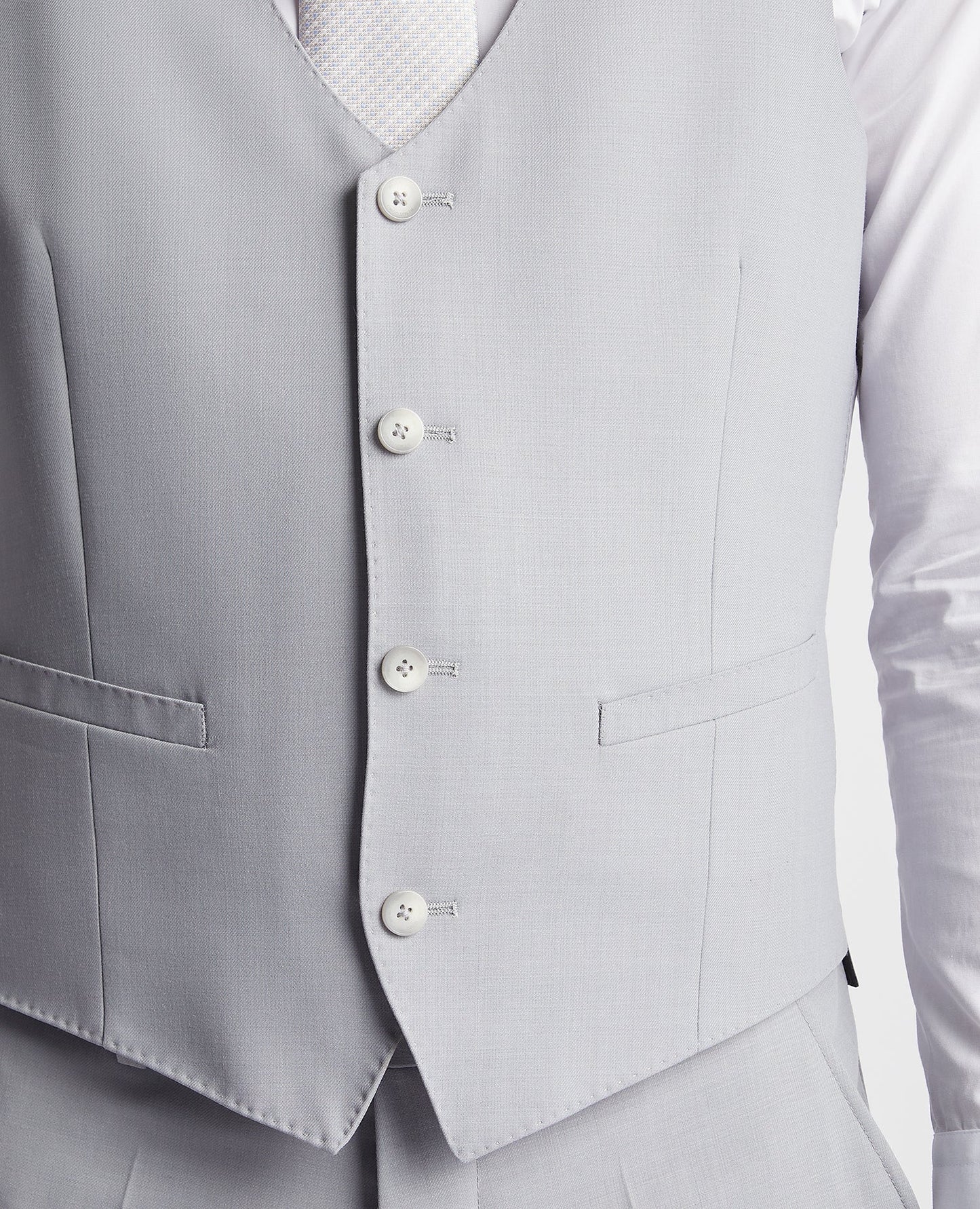 Man wearing a blue Slim Fit Wool Rich Mix and Match Waistcoat