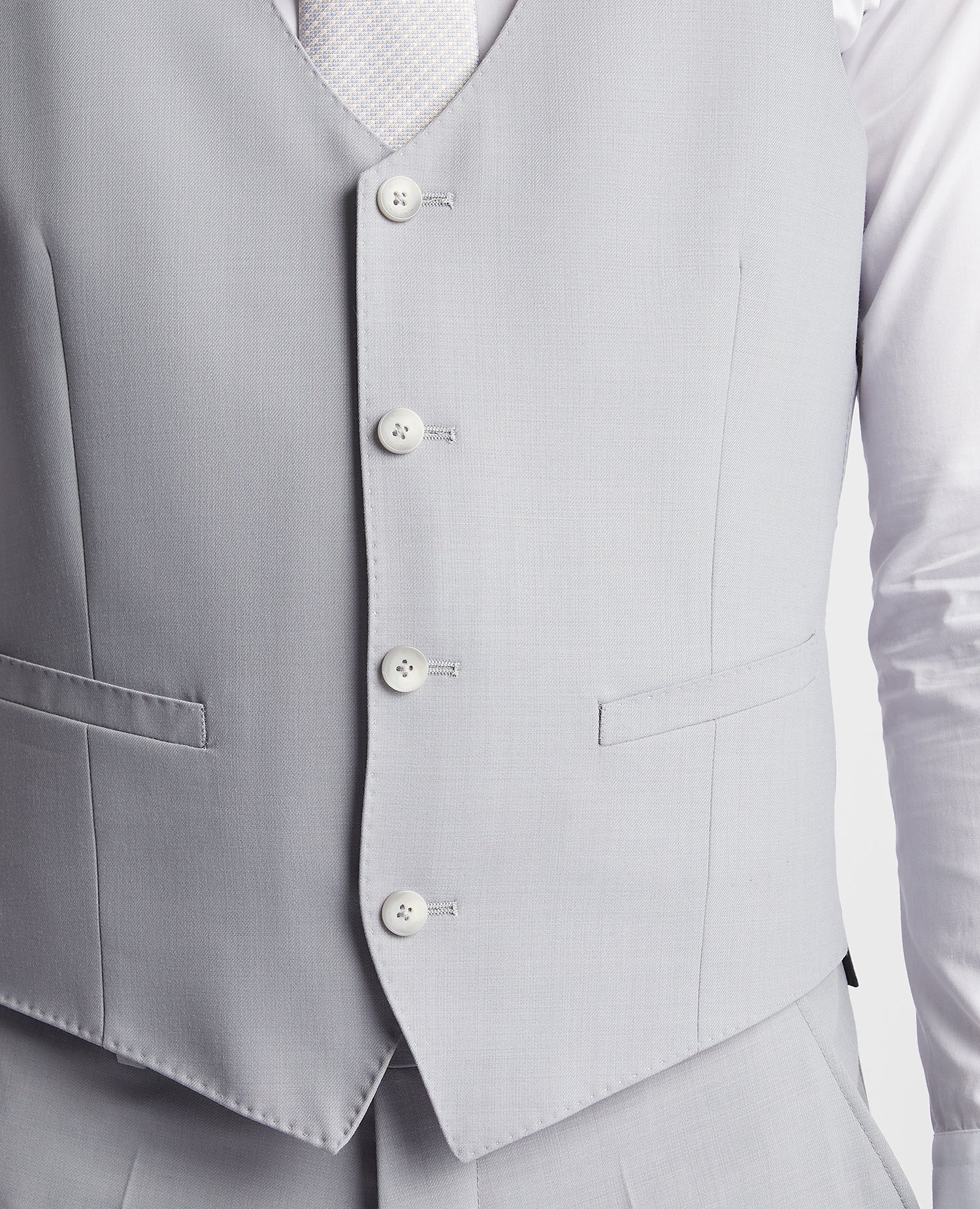 Man wearing a blue Slim Fit Wool Rich Mix and Match Waistcoat