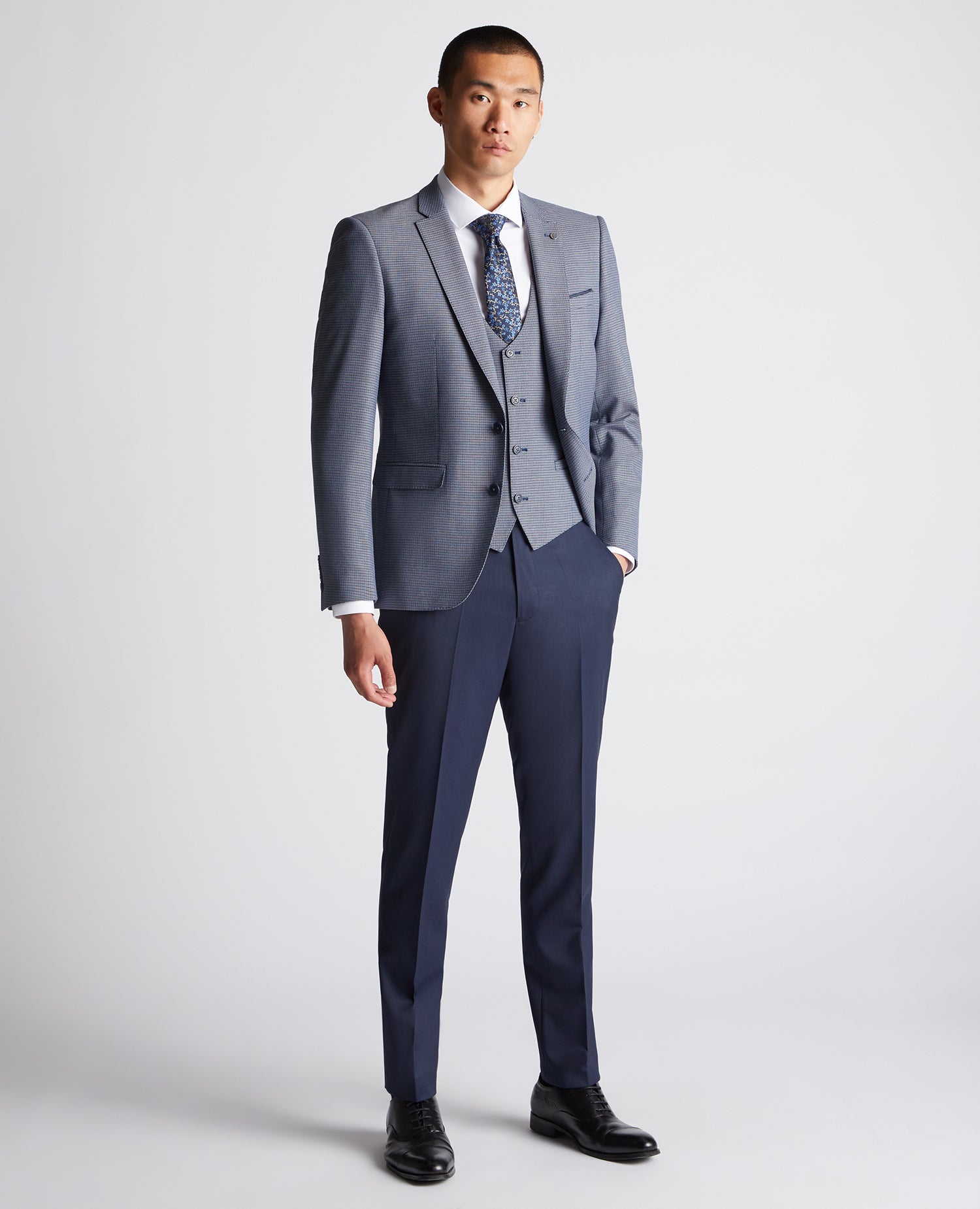 Man wearing a blue Slim Fit Stretch Waistcoat