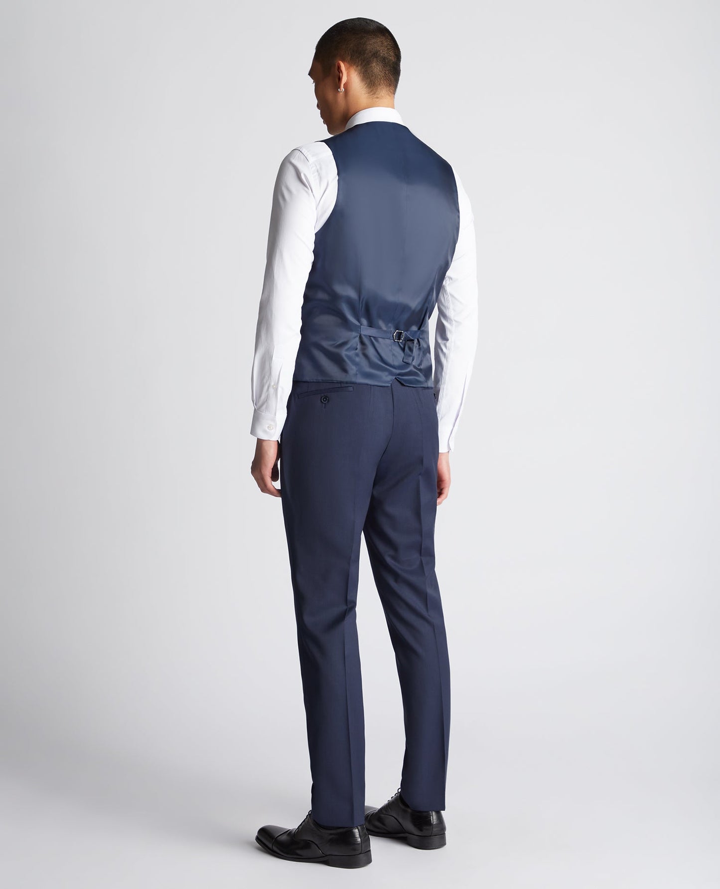 Man wearing a blue Slim Fit Stretch Waistcoat