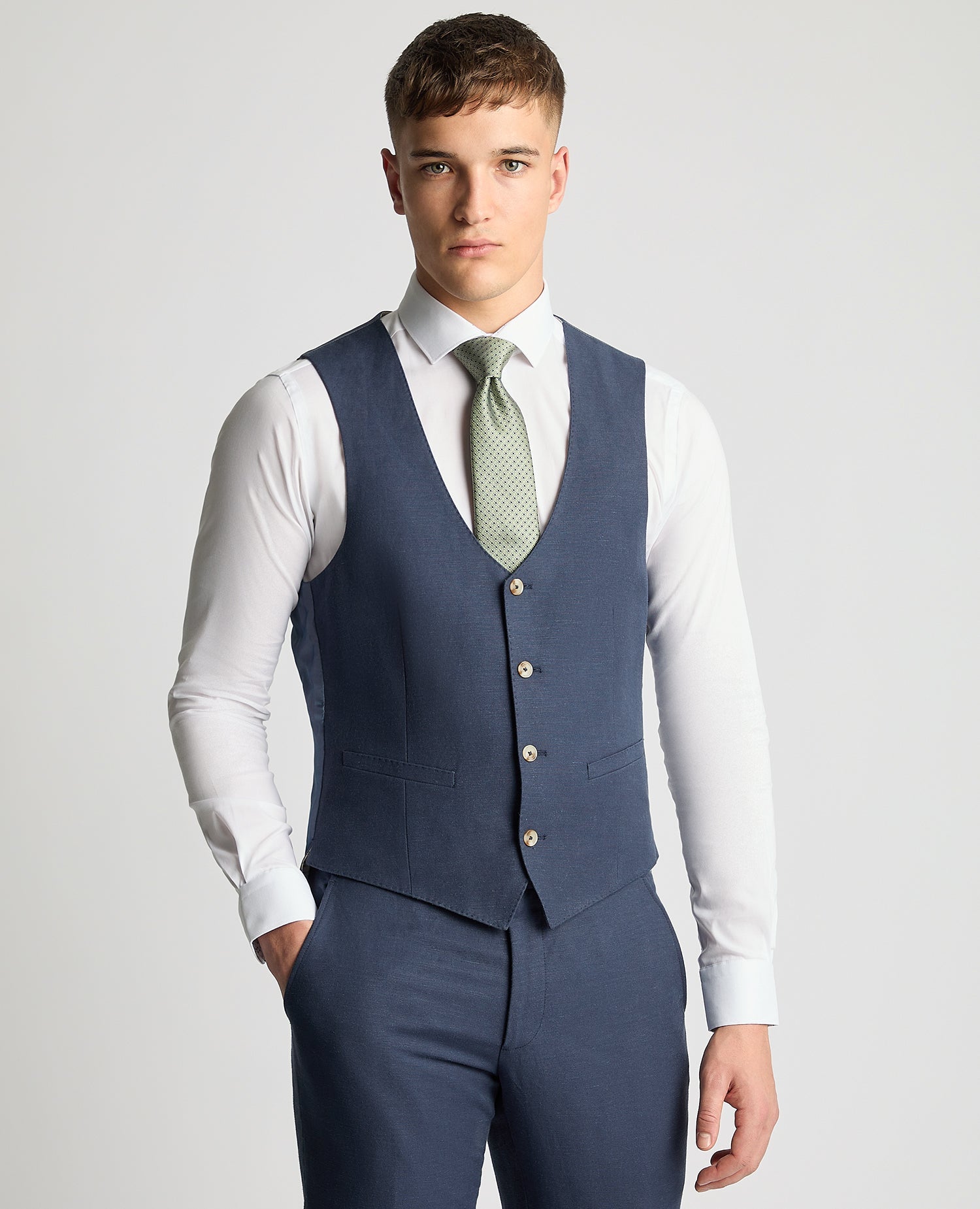 Man wearing a blue Slim Fit Linen-Blend Waistcoat