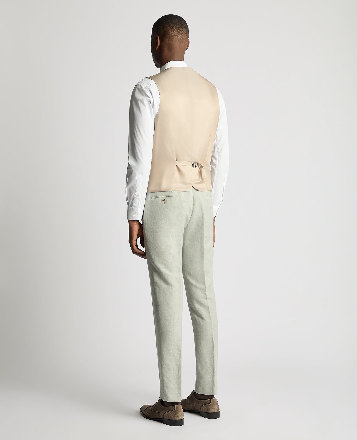 Man wearing a green Slim Fit Linen-Blend Waistcoat