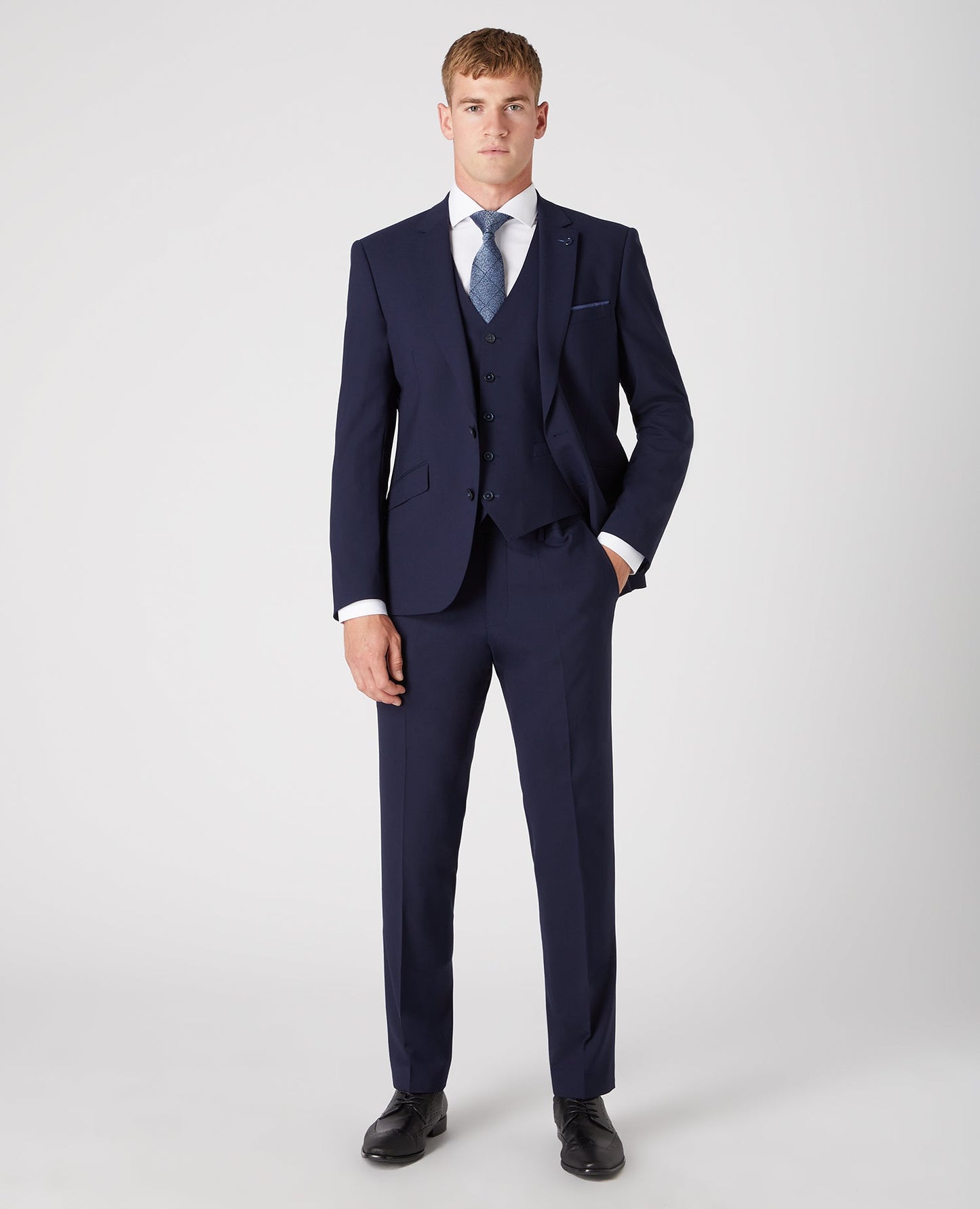 Man wearing a navy Tapered Fit Wool-Rich Mix and Match Waistcoat