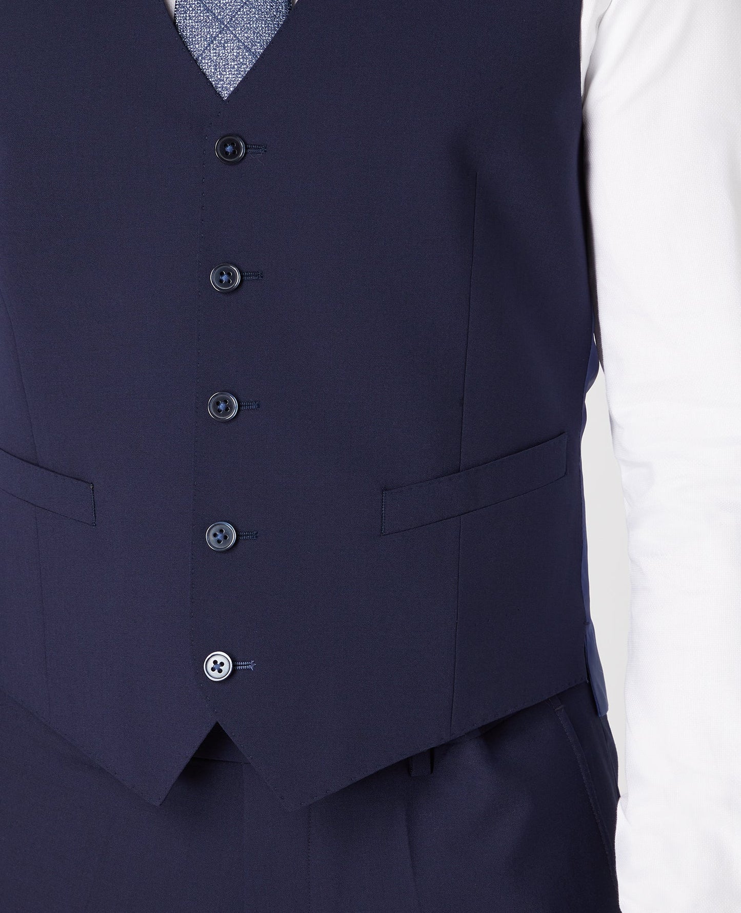 Man wearing a navy Tapered Fit Wool-Rich Mix and Match Waistcoat