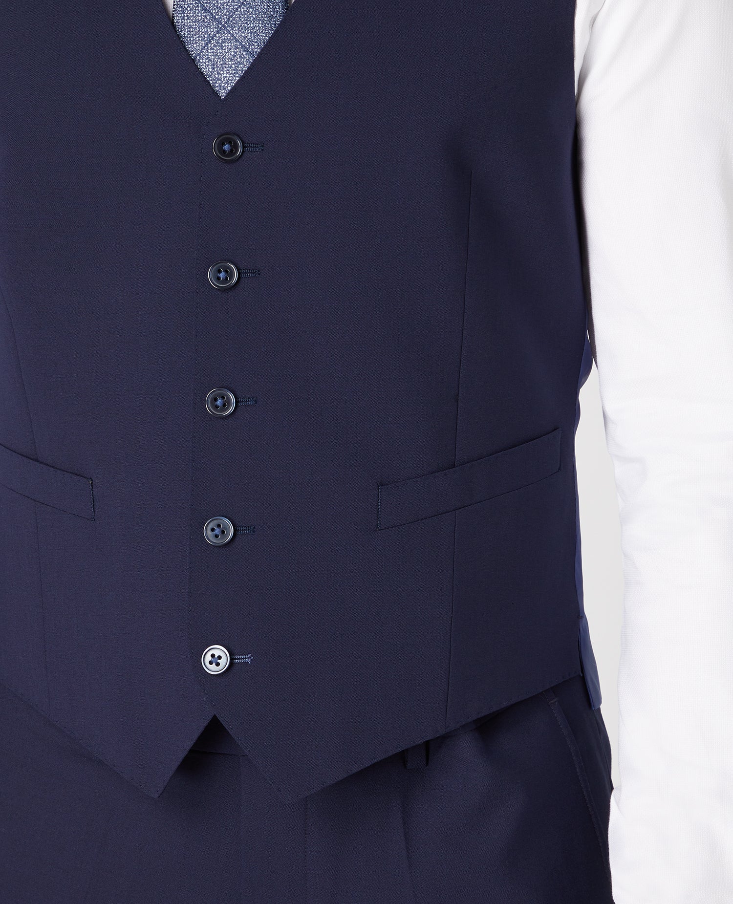 Man wearing a navy Tapered Fit Wool-Rich Mix and Match Waistcoat