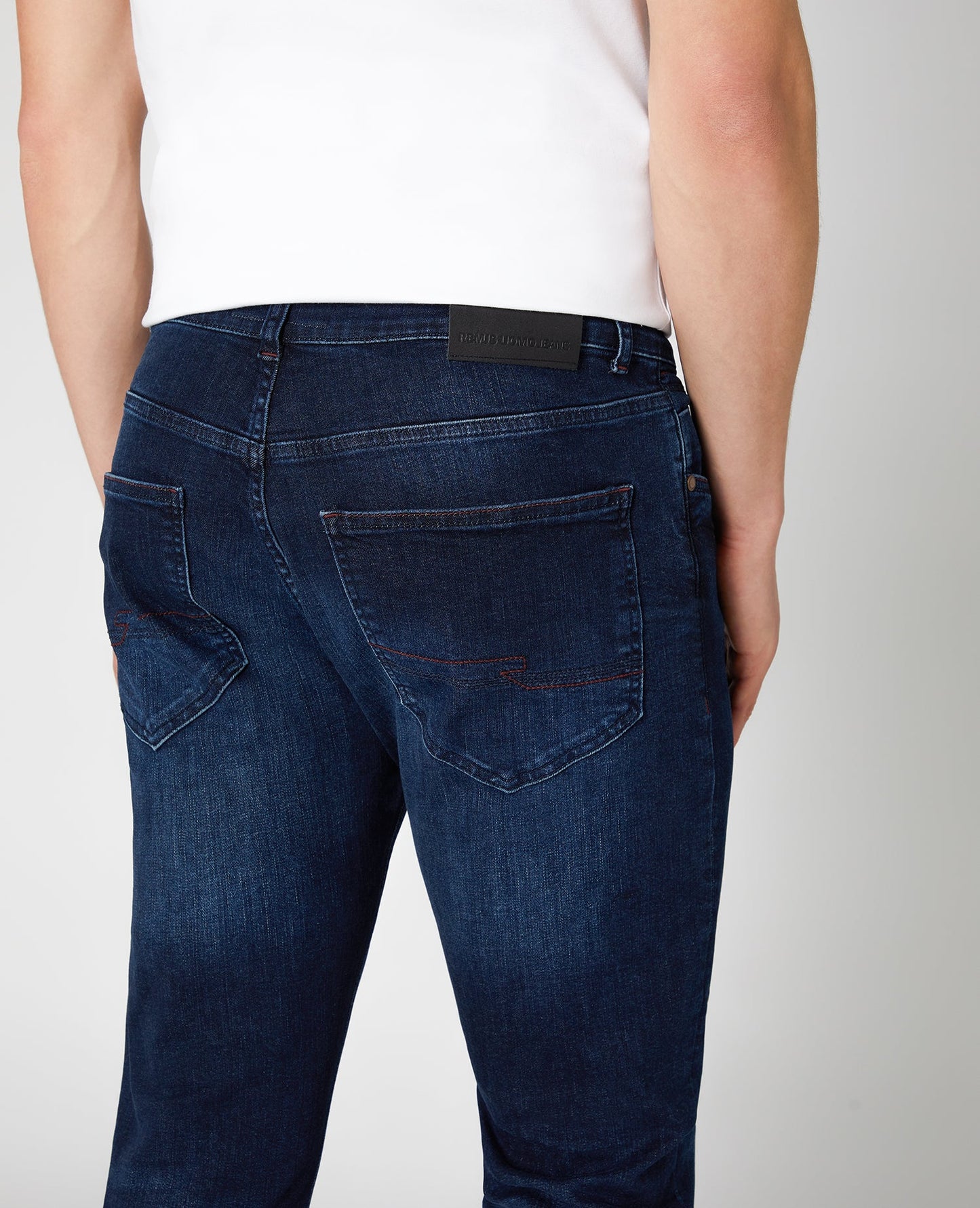 Man wearing a blue X-Slim Fit Cotton-Stretch Jean