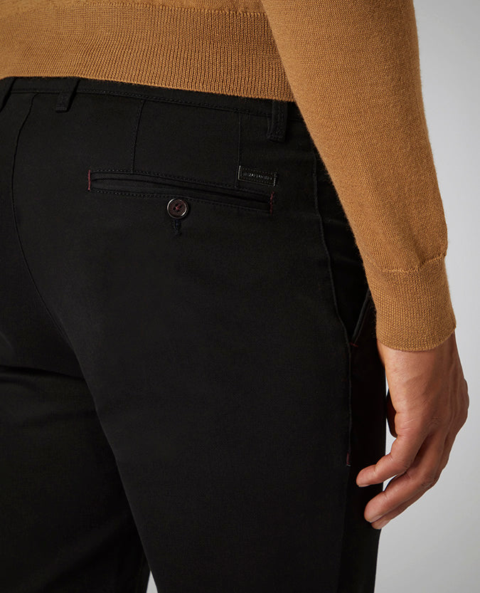 Man wearing a black X-Slim Leg Cotton-Stretch Chino