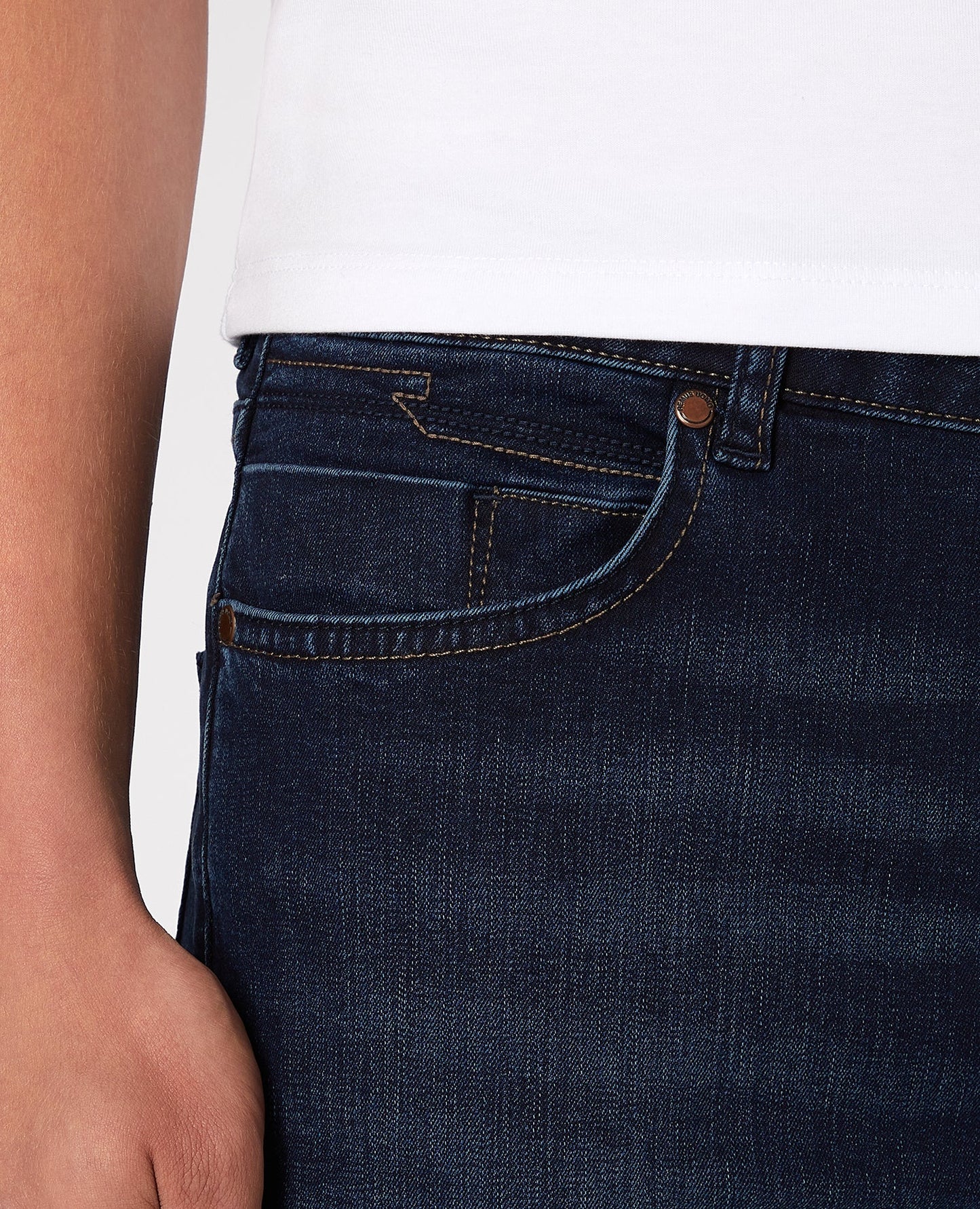Man wearing a navy Apollo Slim Leg Cotton Power Stretch Jean