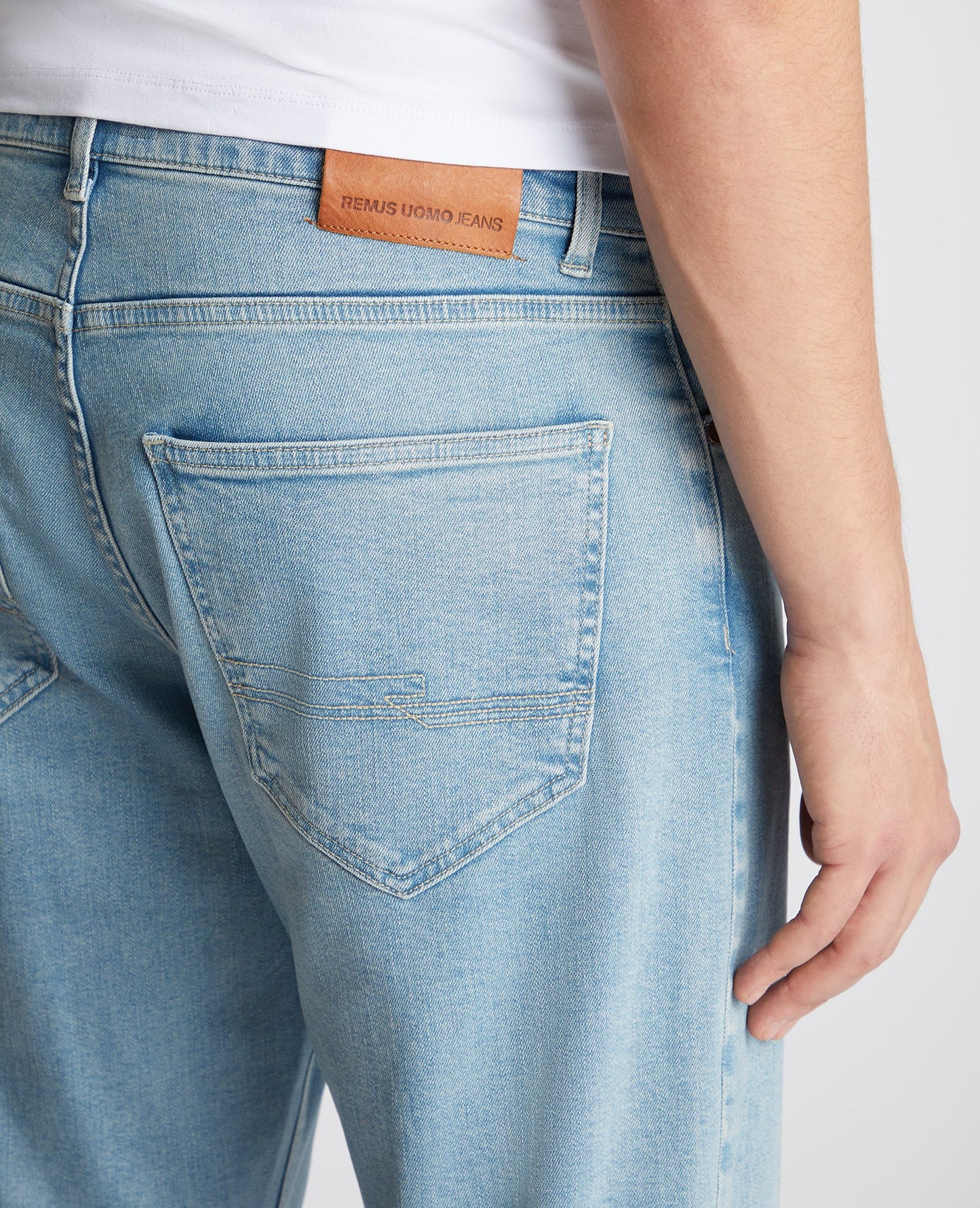 Man wearing a blue Roman Modern Straight Fit Comfort Stretch Jean