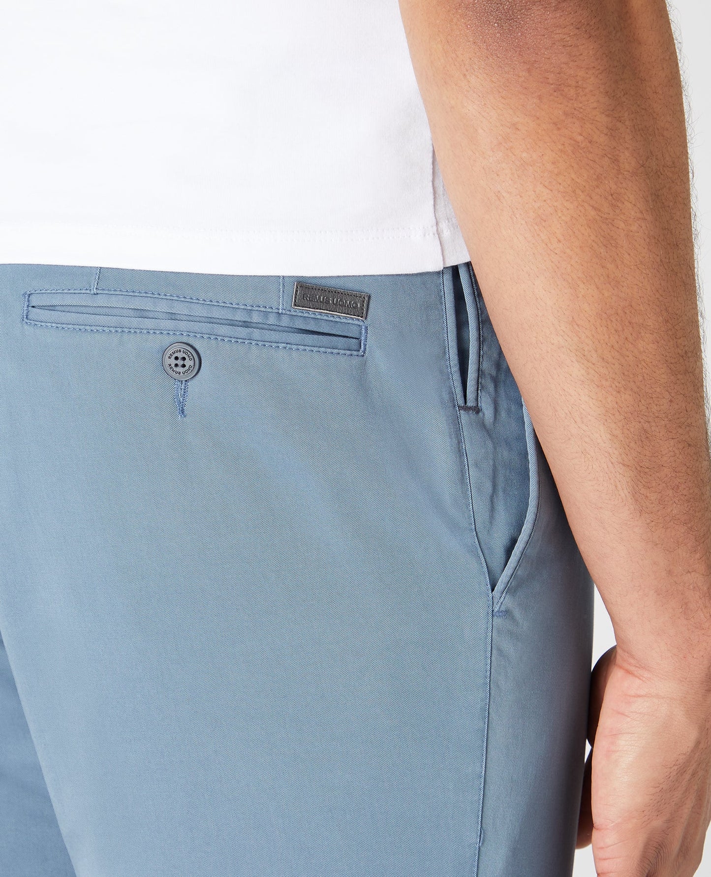 Man wearing a blue Slim Leg Cotton Stretch Chinos