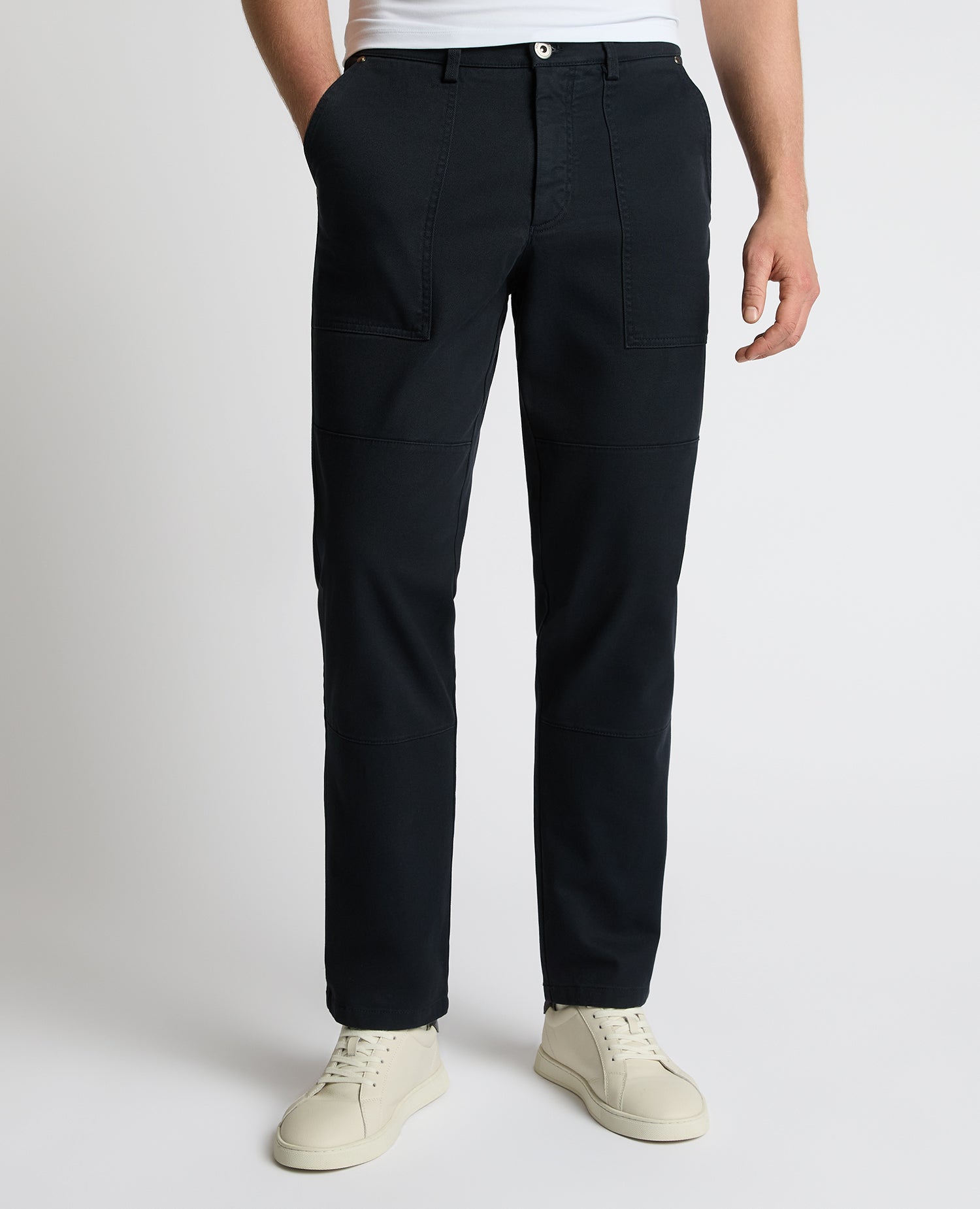 Man wearing a navy Straight Leg Cotton-Stretch Carpenter Pant