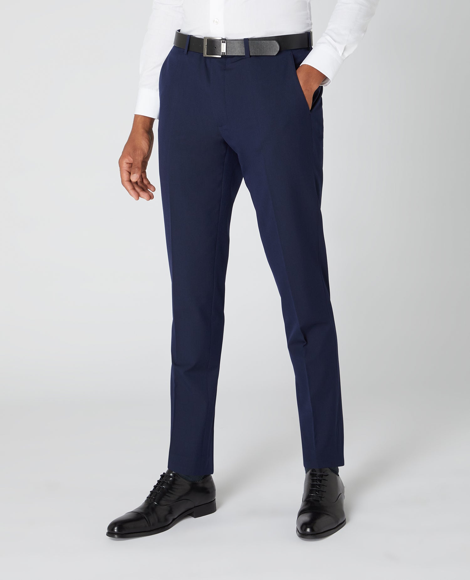 Man wearing a navy Slim Leg Formal Trousers