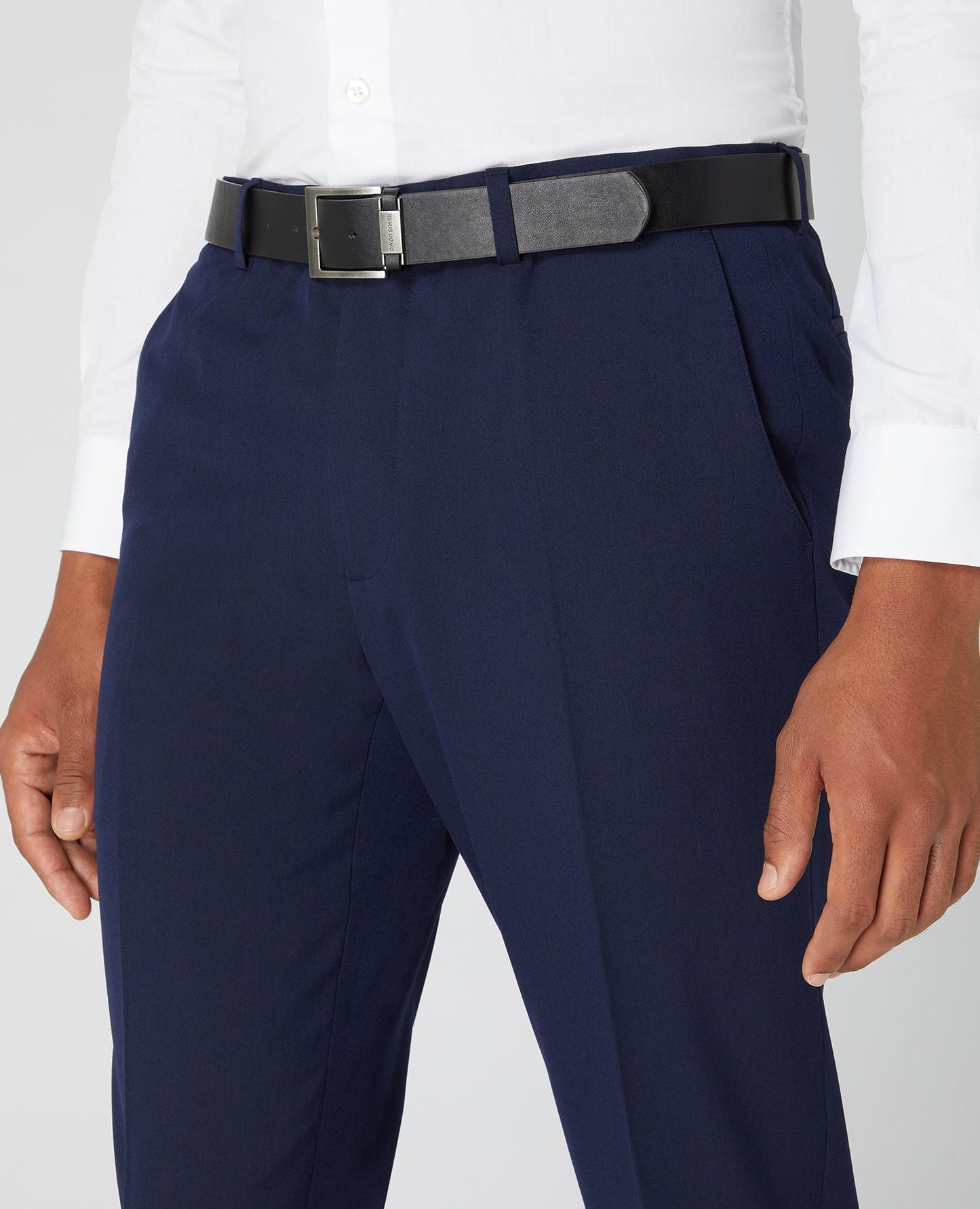 Man wearing a navy Slim Leg Formal Trousers