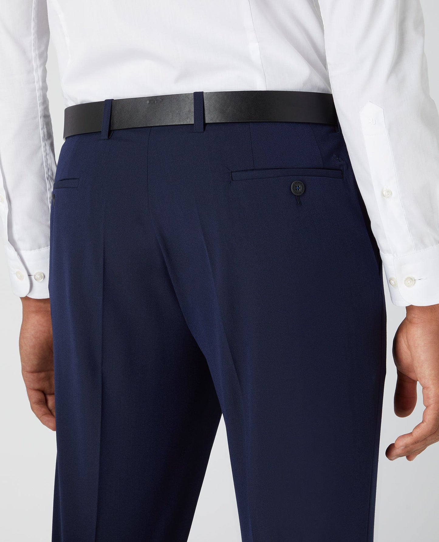 Man wearing a navy Slim Leg Formal Trousers