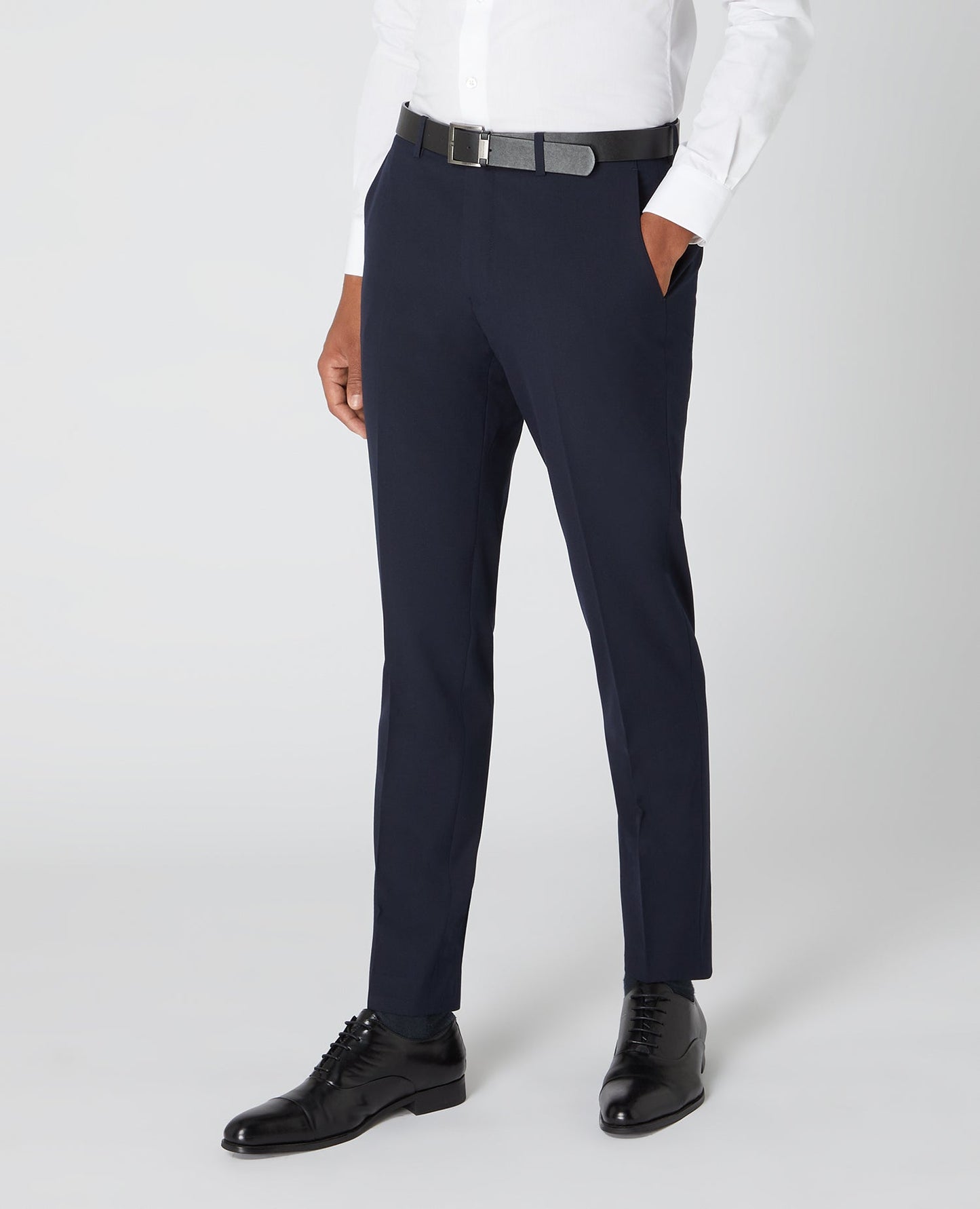 Man wearing a navy Slim Leg Formal Trousers