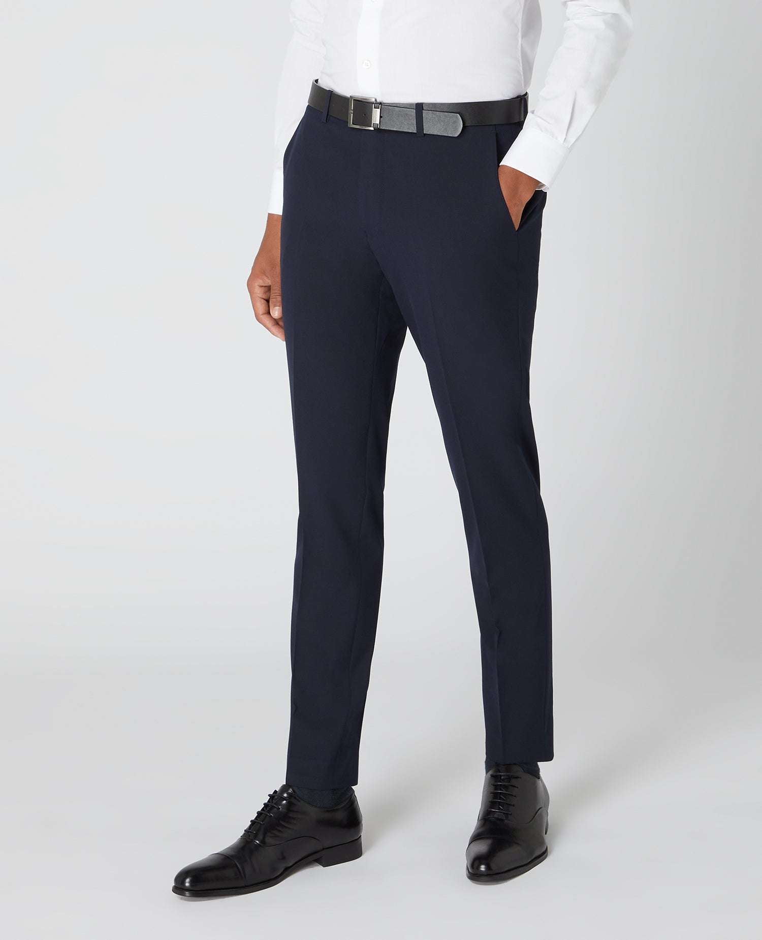 Man wearing a navy Slim Leg Formal Trousers